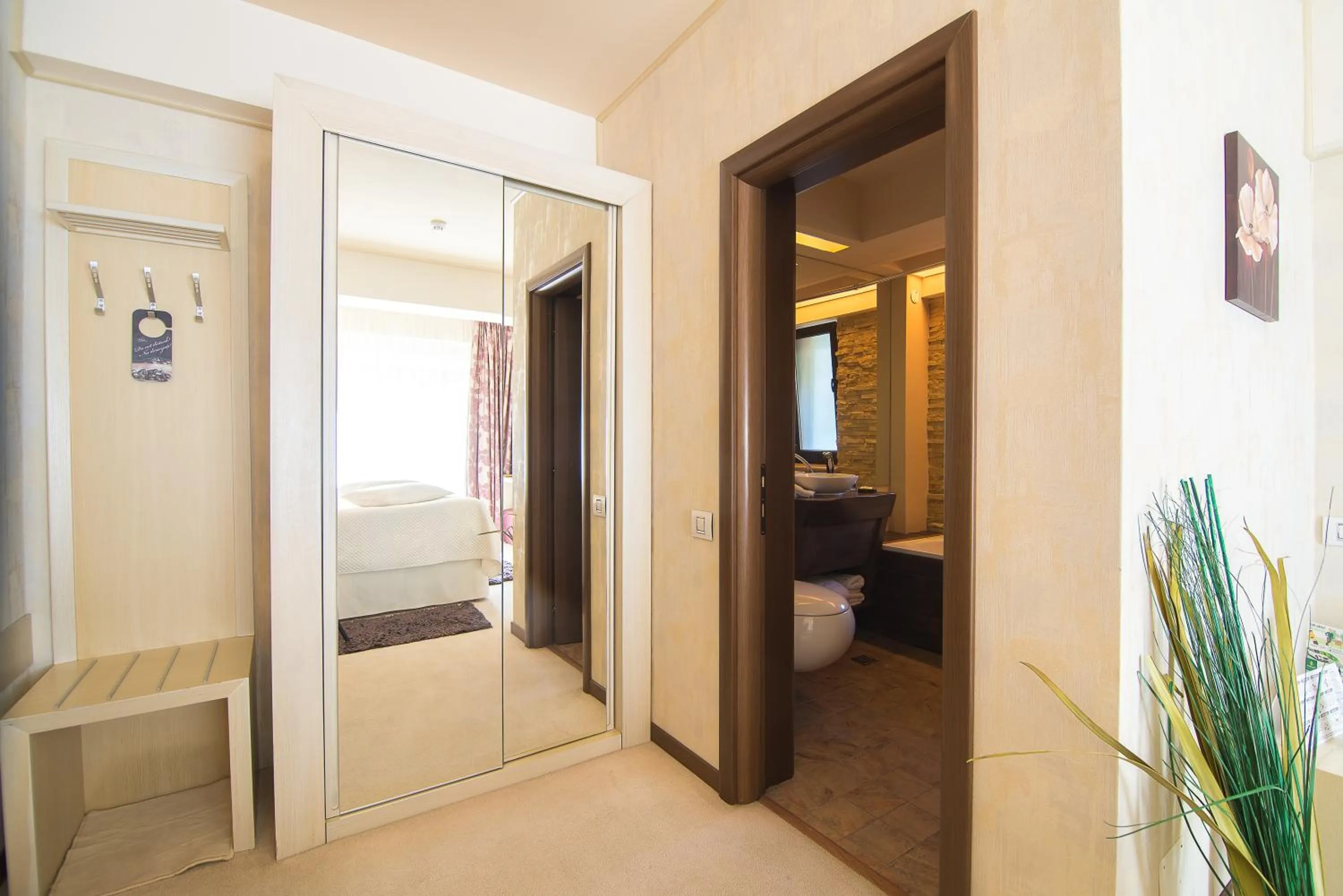 Bed in Ioana Boutique Hotel