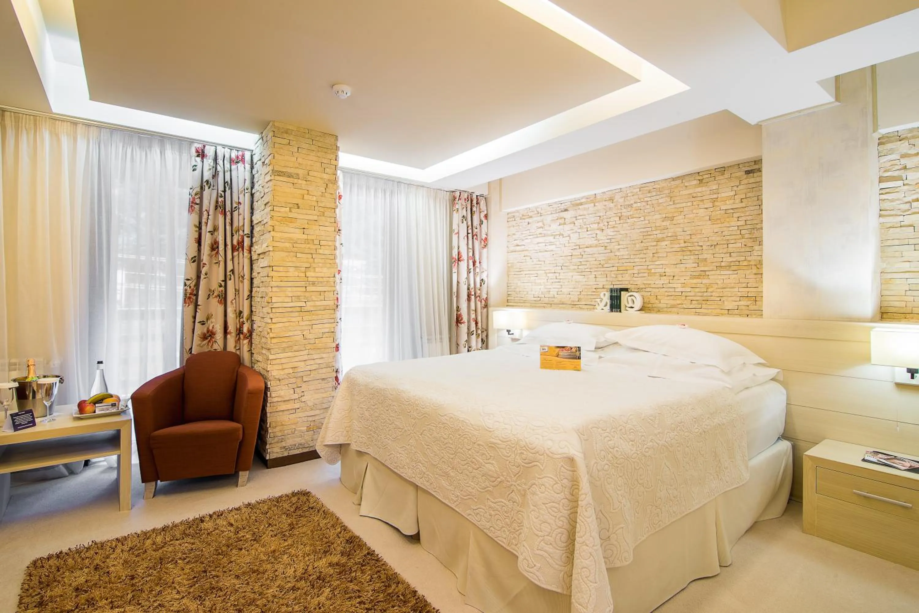 Bed in Ioana Boutique Hotel