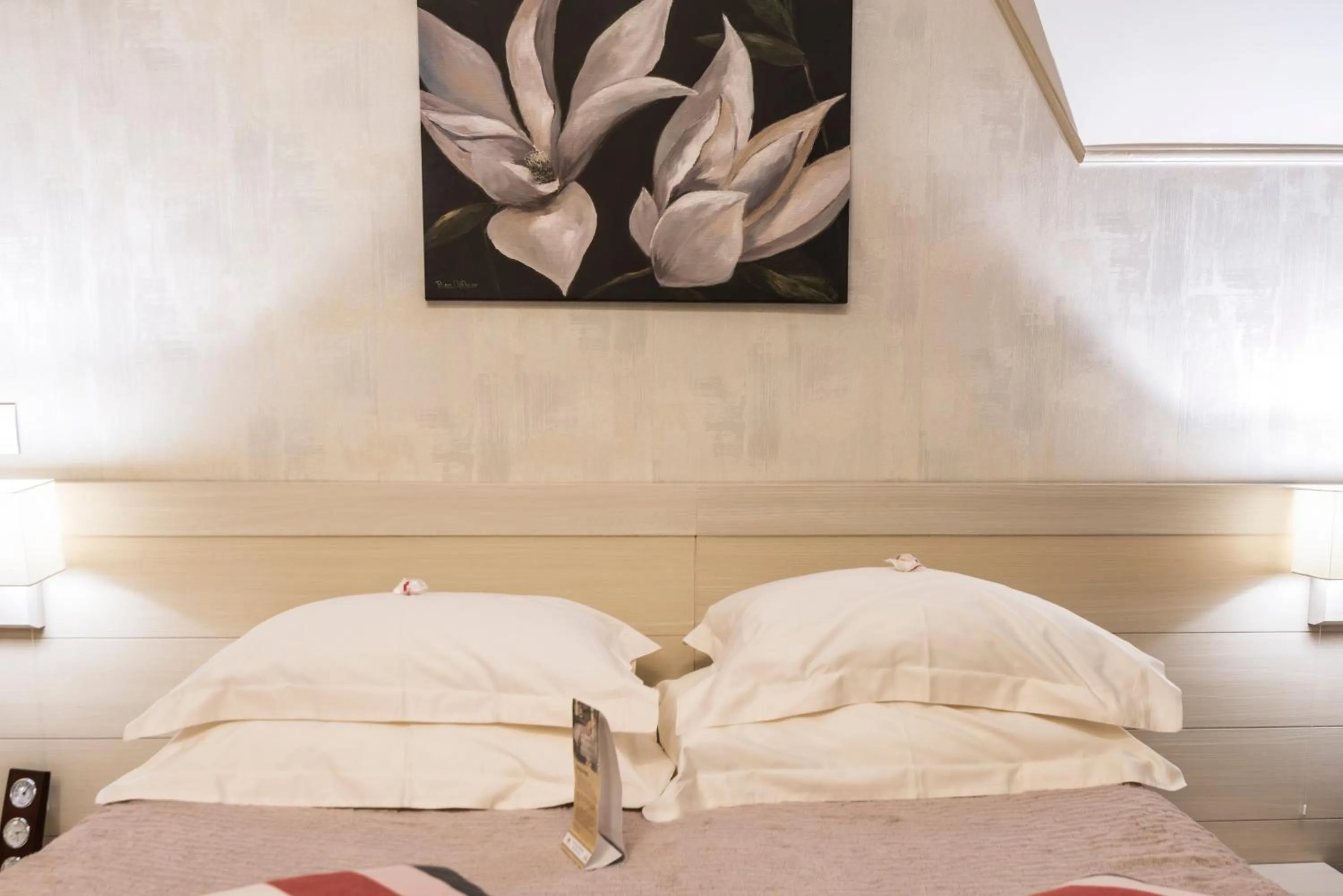 Bed in Ioana Boutique Hotel