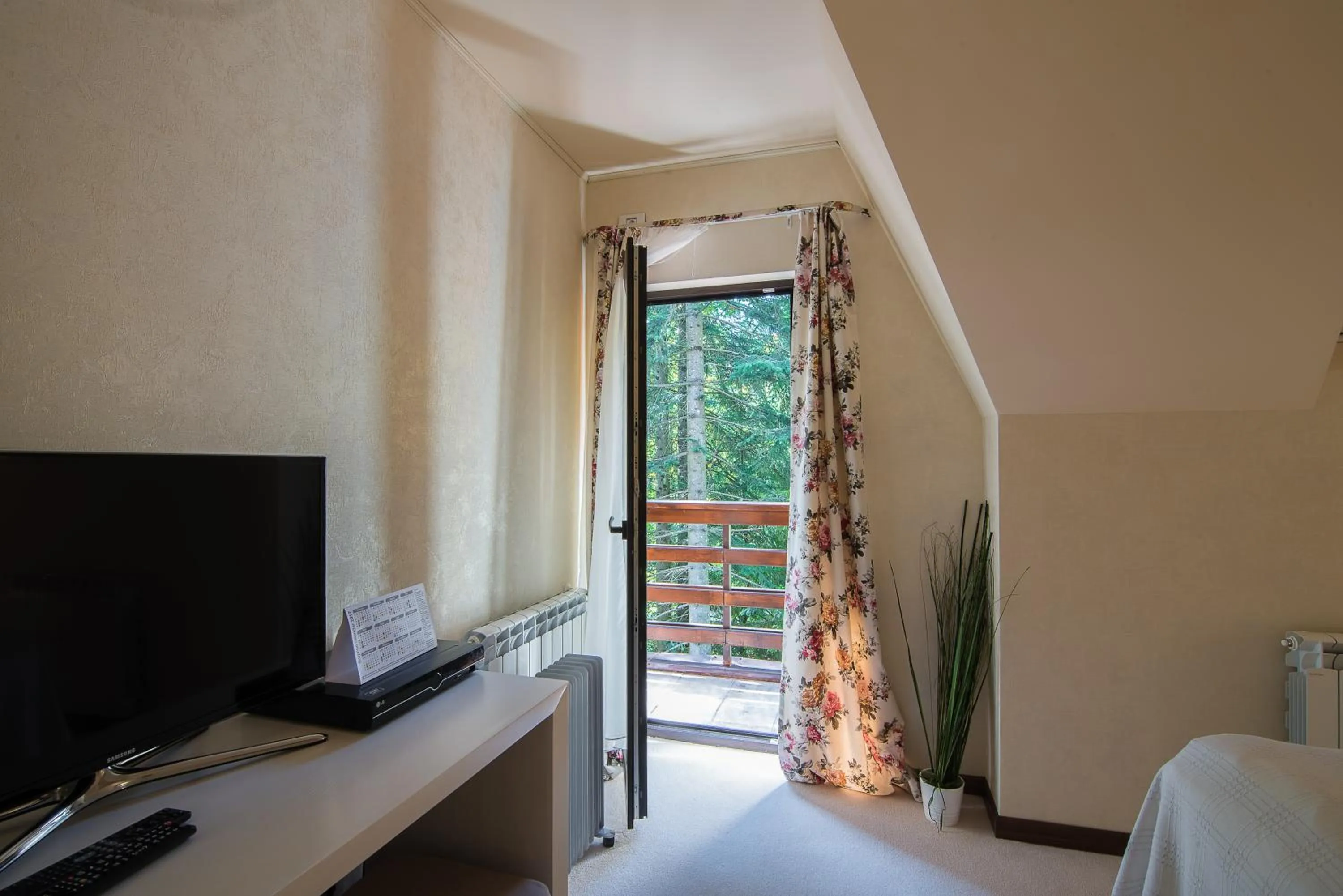 Bed in Ioana Boutique Hotel