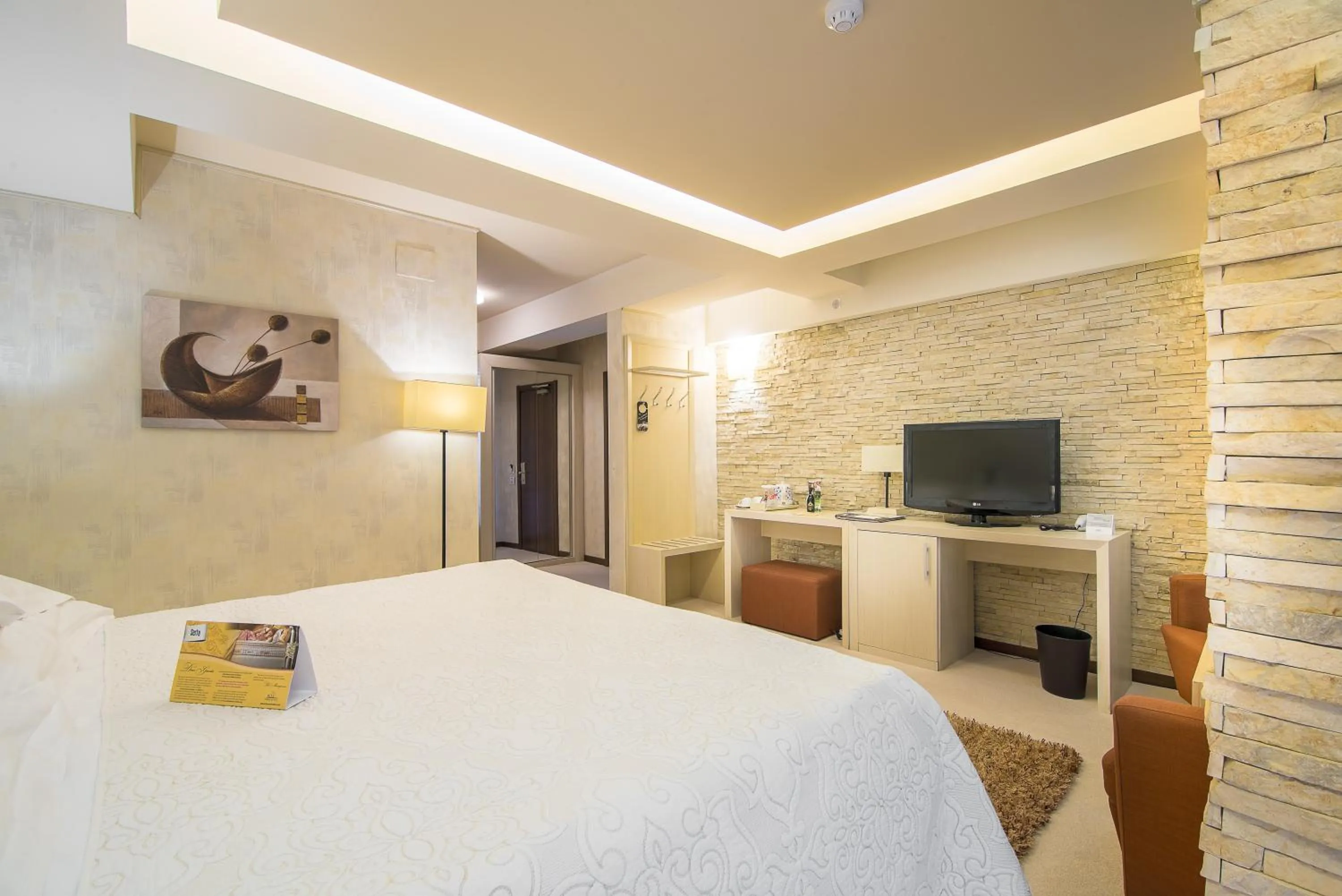 Bed in Ioana Boutique Hotel