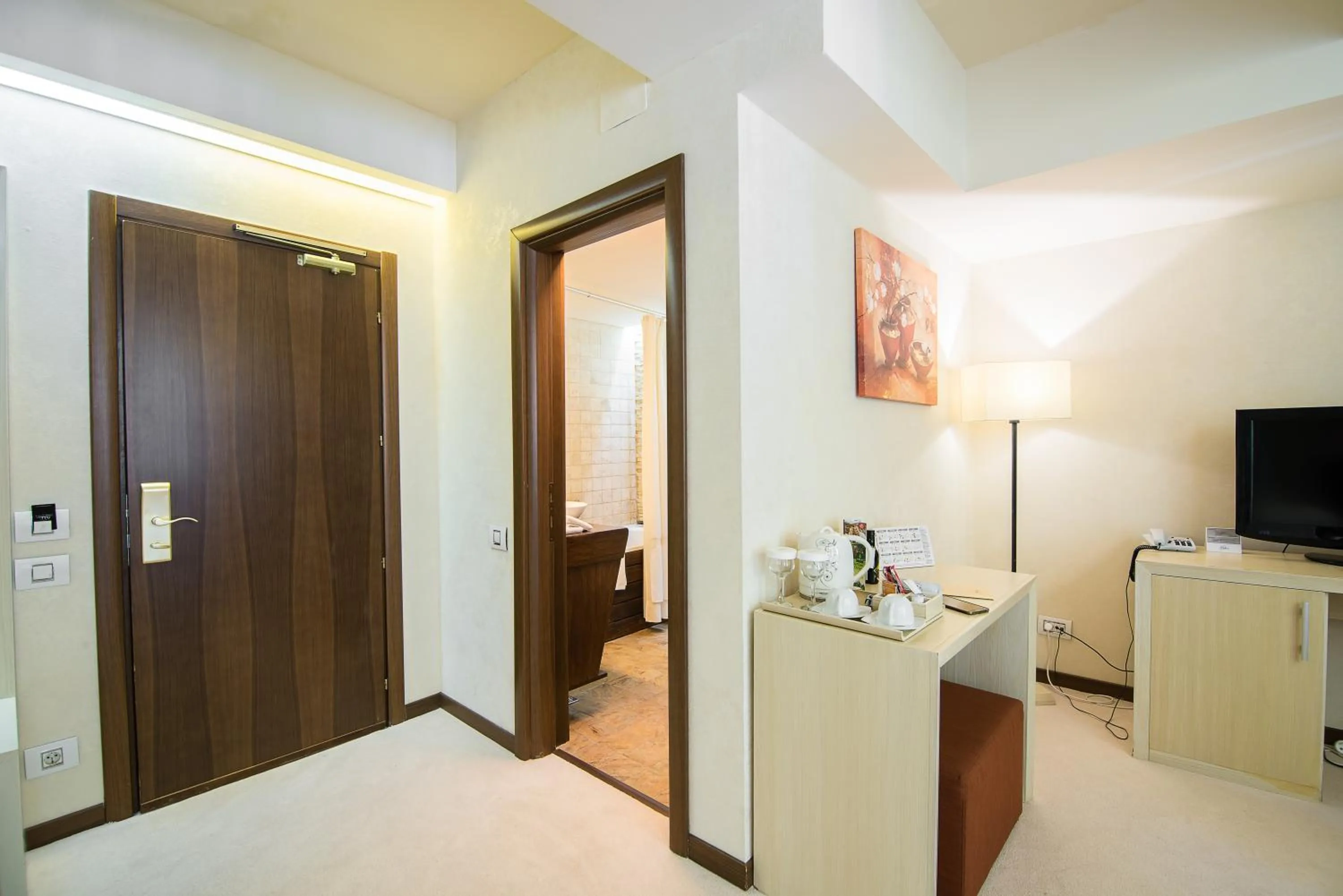 Bed in Ioana Boutique Hotel