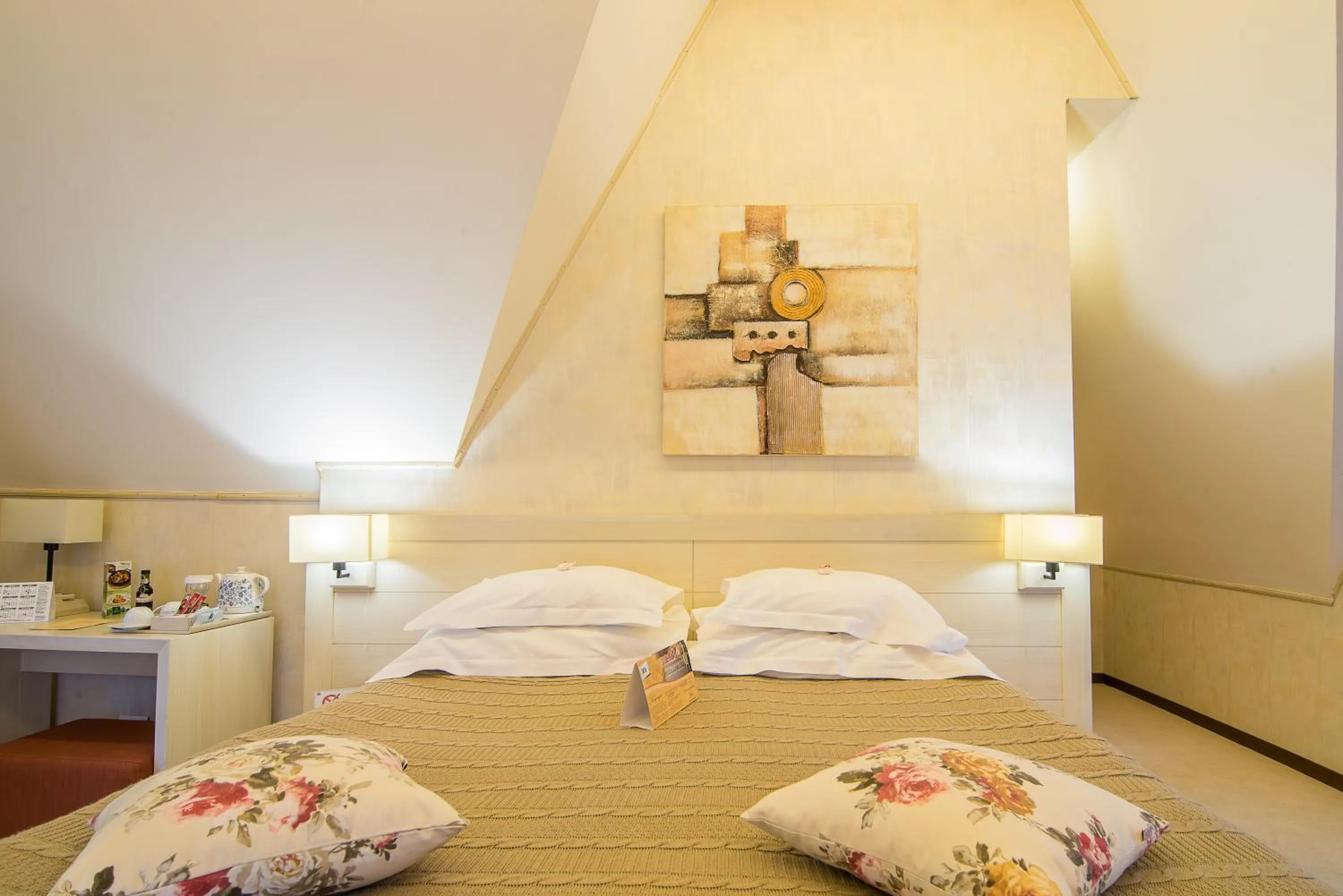 Bed in Ioana Boutique Hotel