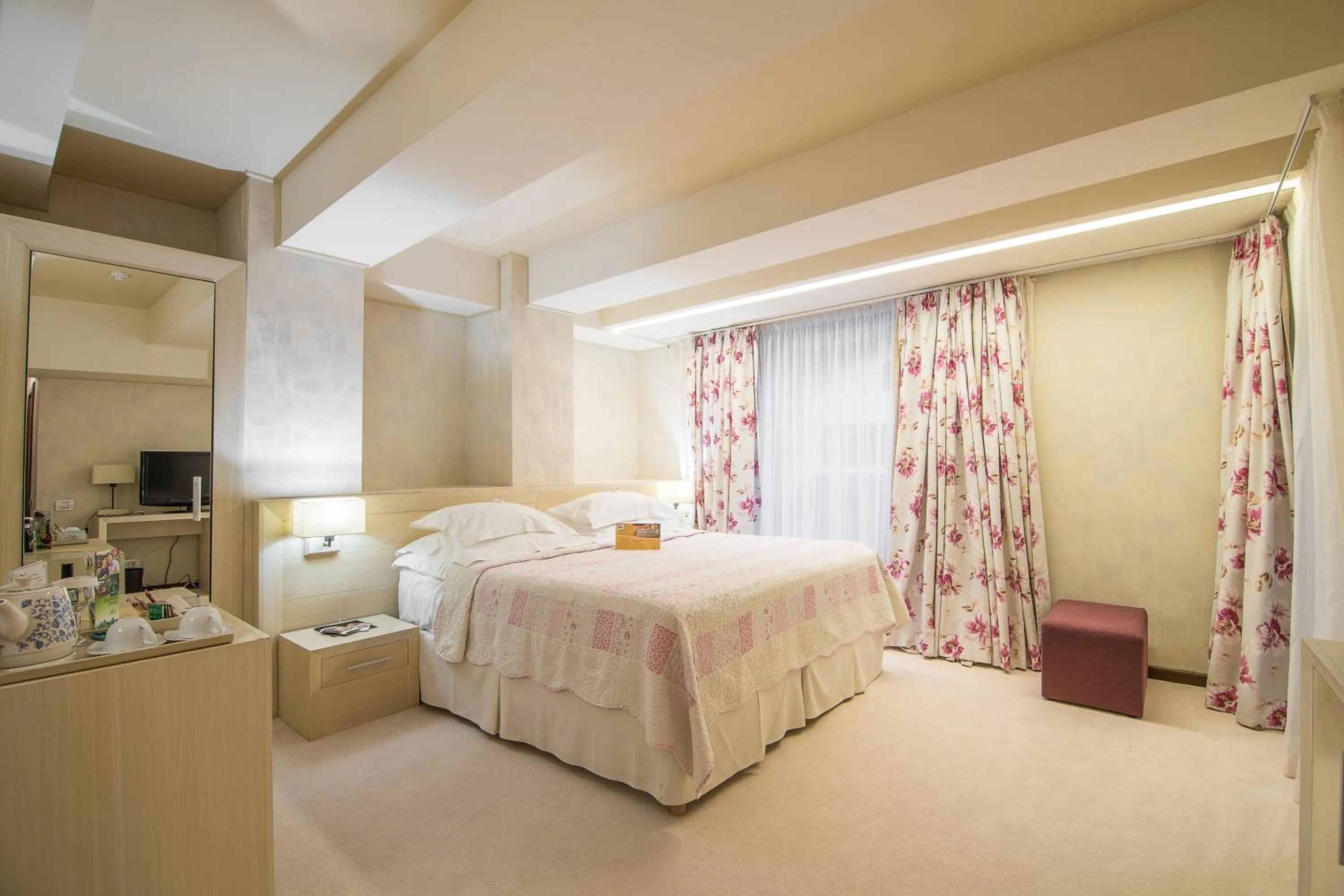 Bed in Ioana Boutique Hotel