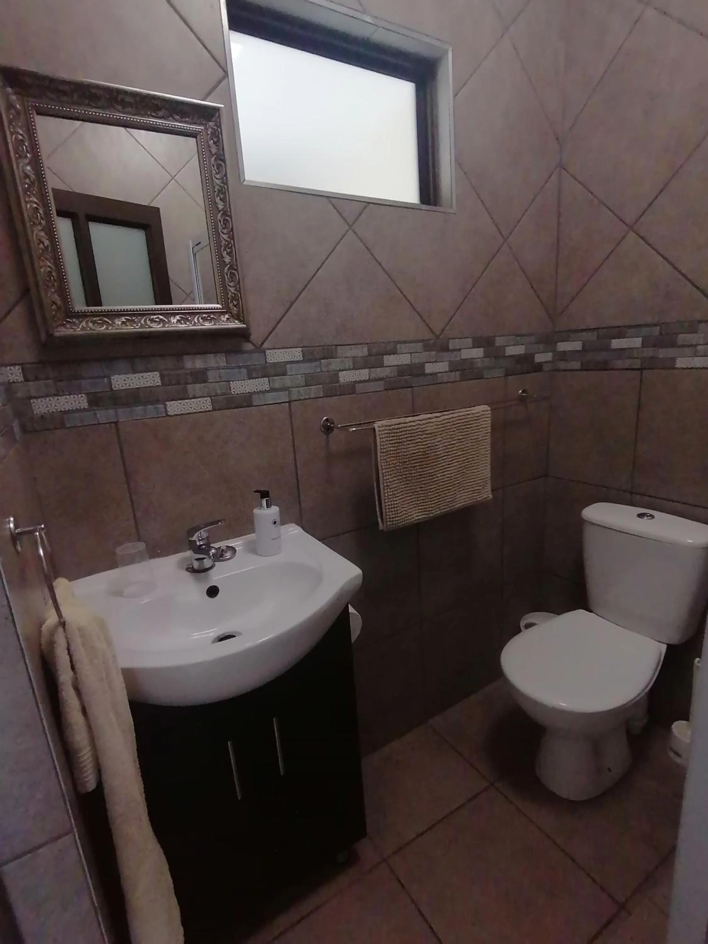 Toilet in Blue Sea Guest House