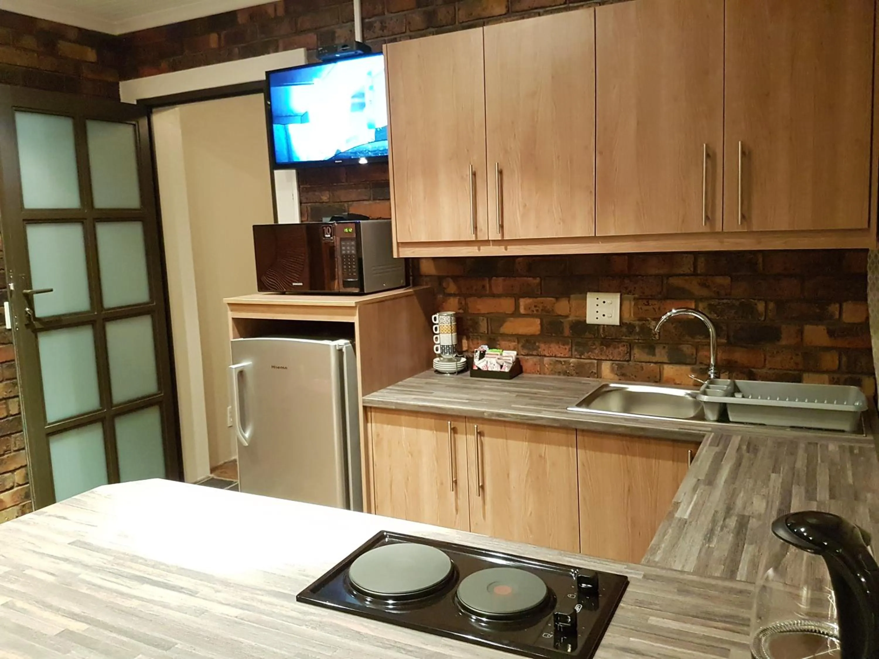 Kitchen or kitchenette in Blue Sea Guest House