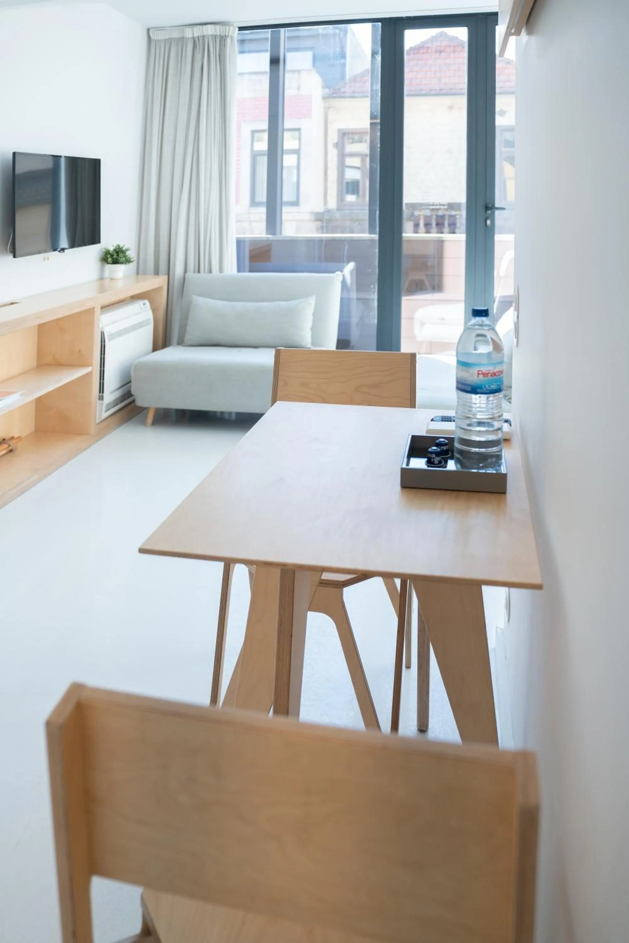 Communal lounge/ TV room in I Loft Porto