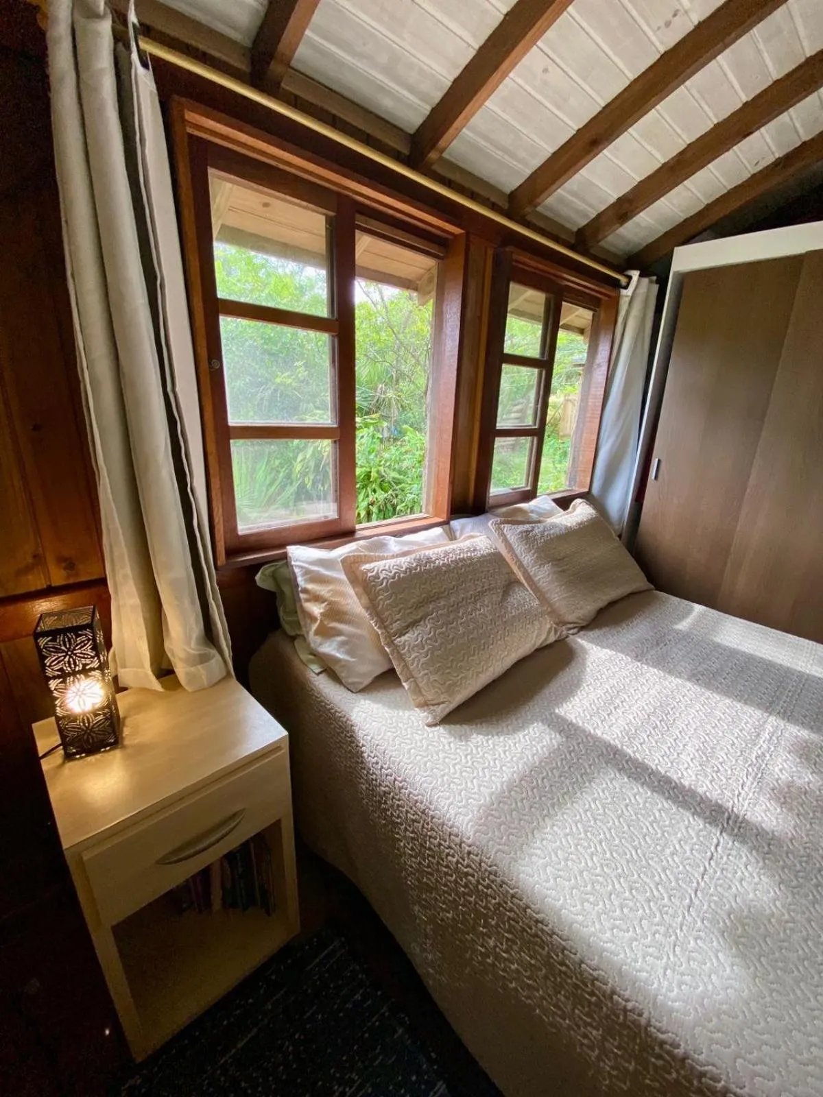 Bed in Recanto das Bromélias Chalés