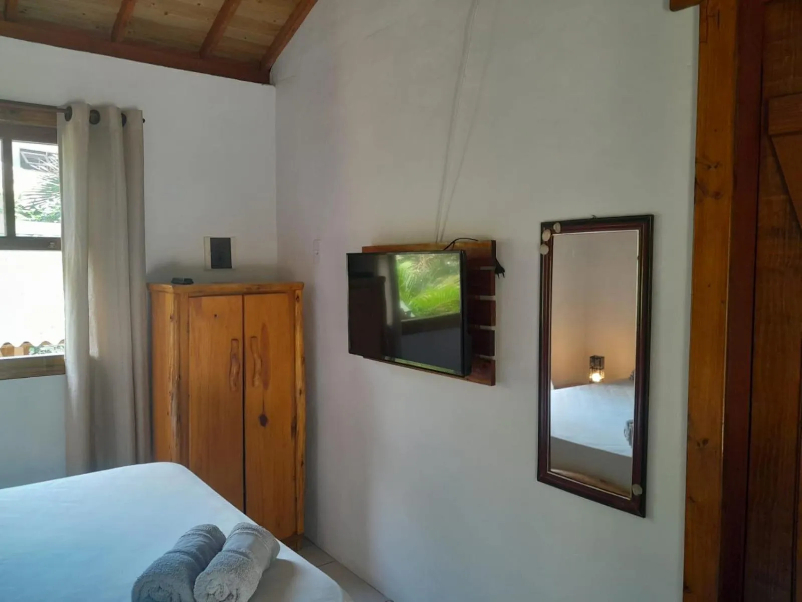 Bed in Recanto das Bromélias Chalés