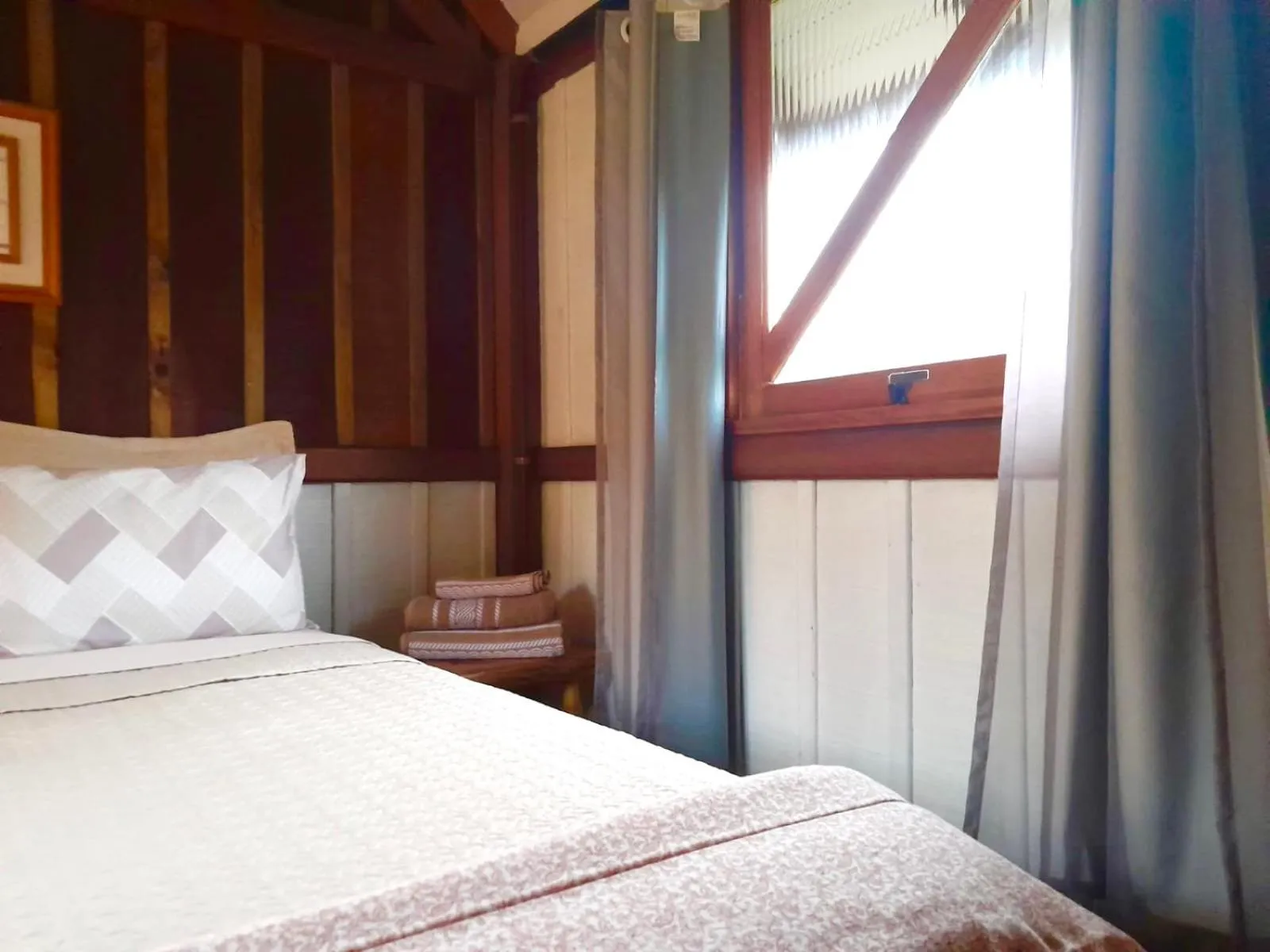 Bed in Recanto das Bromélias Chalés