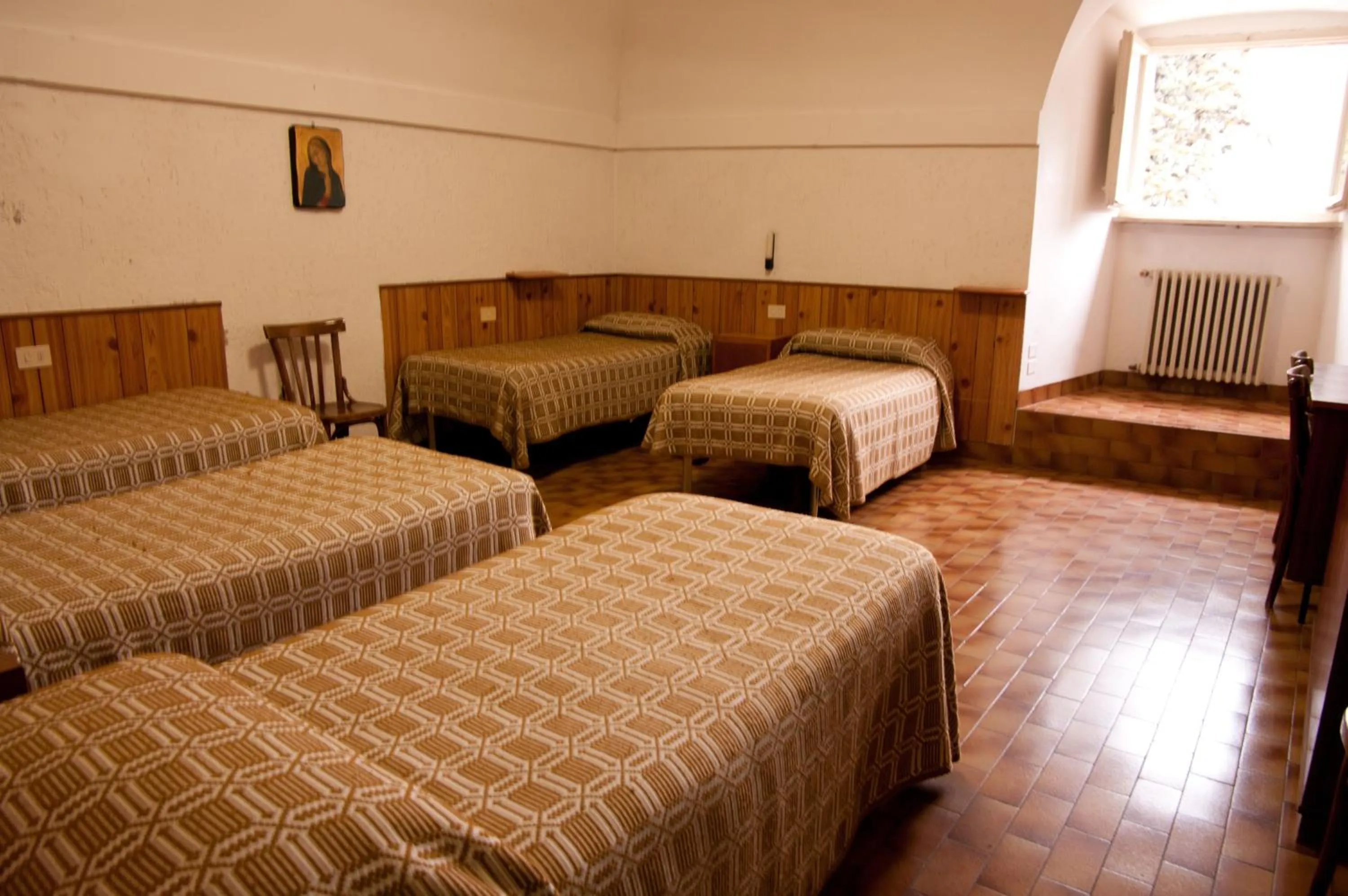 Photo of the whole room, Bed in Cittadella Laudato Si'