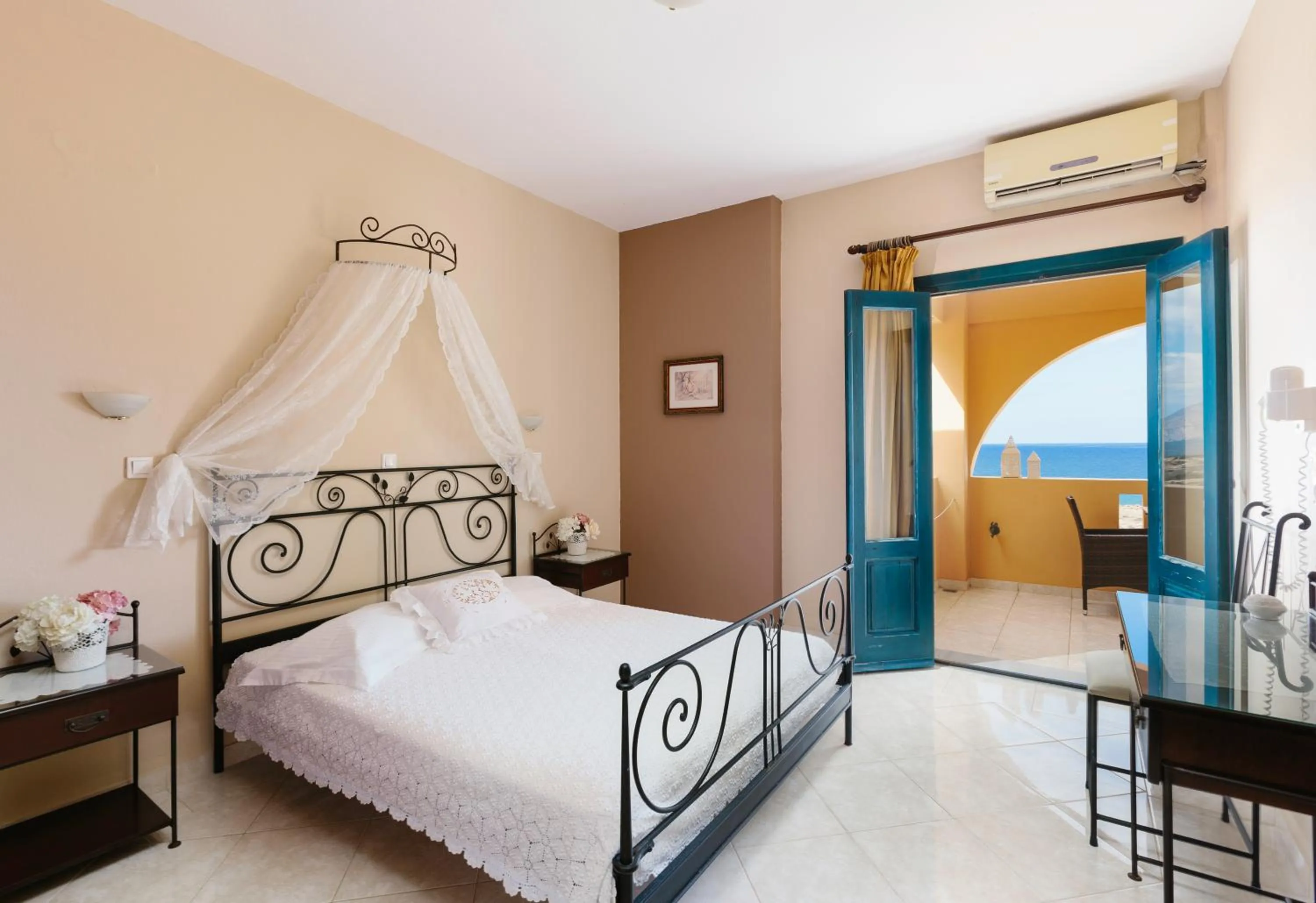 Bed in Archipelagos Apartments