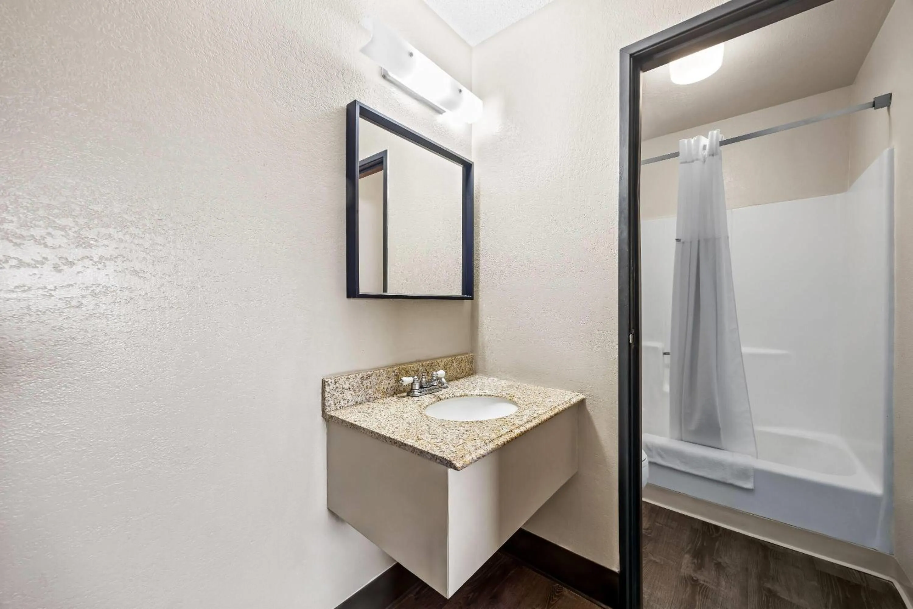 Bathroom in Super 8 by Wyndham Colorado Springs Peterson Space Force