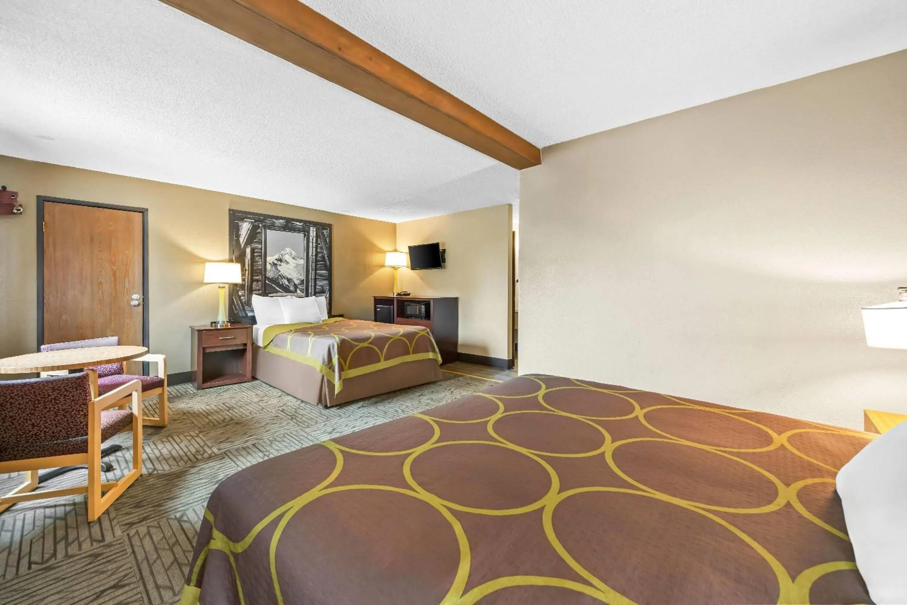 Bed in Super 8 by Wyndham Colorado Springs Peterson Space Force