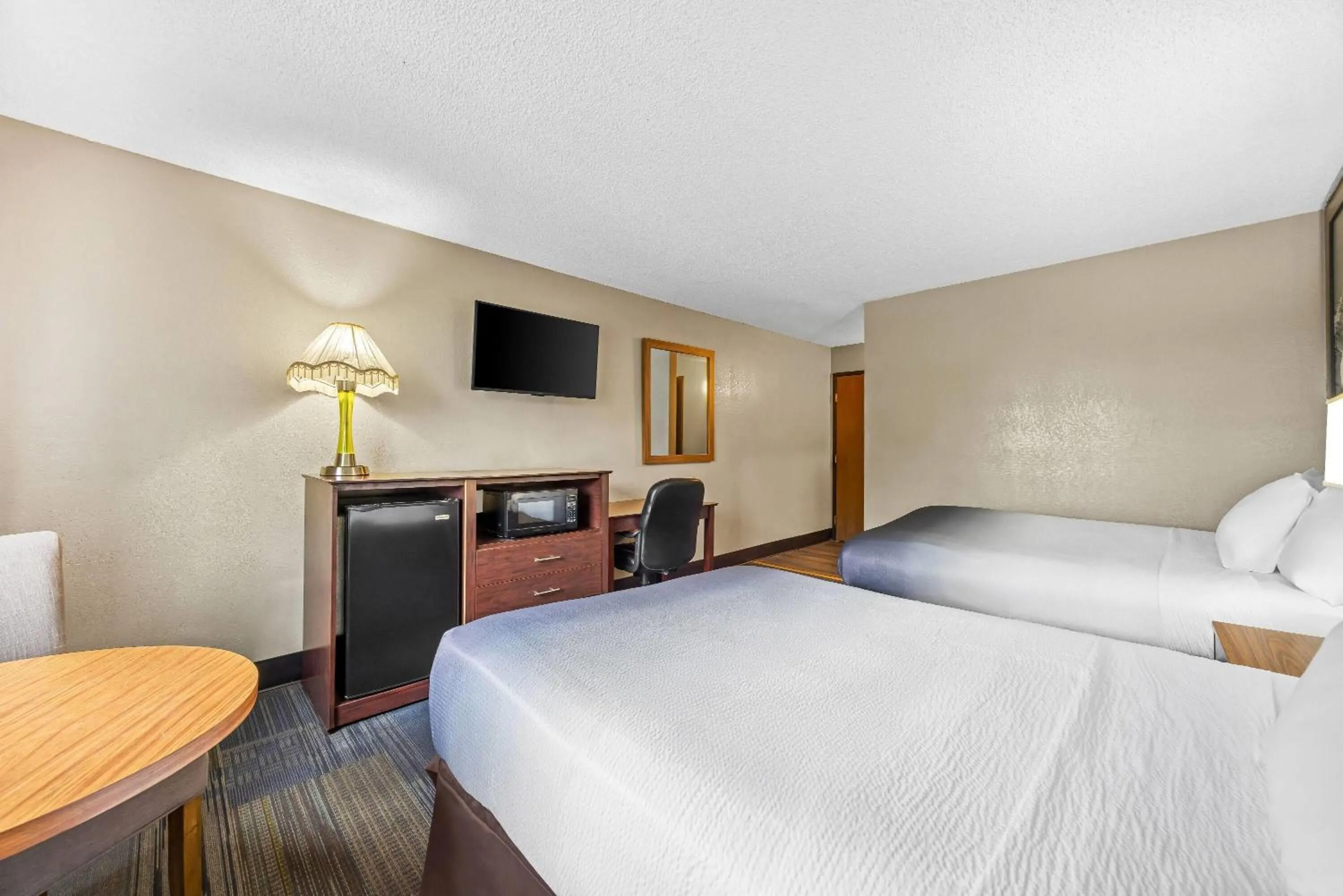 Bed in Super 8 by Wyndham Colorado Springs Peterson Space Force