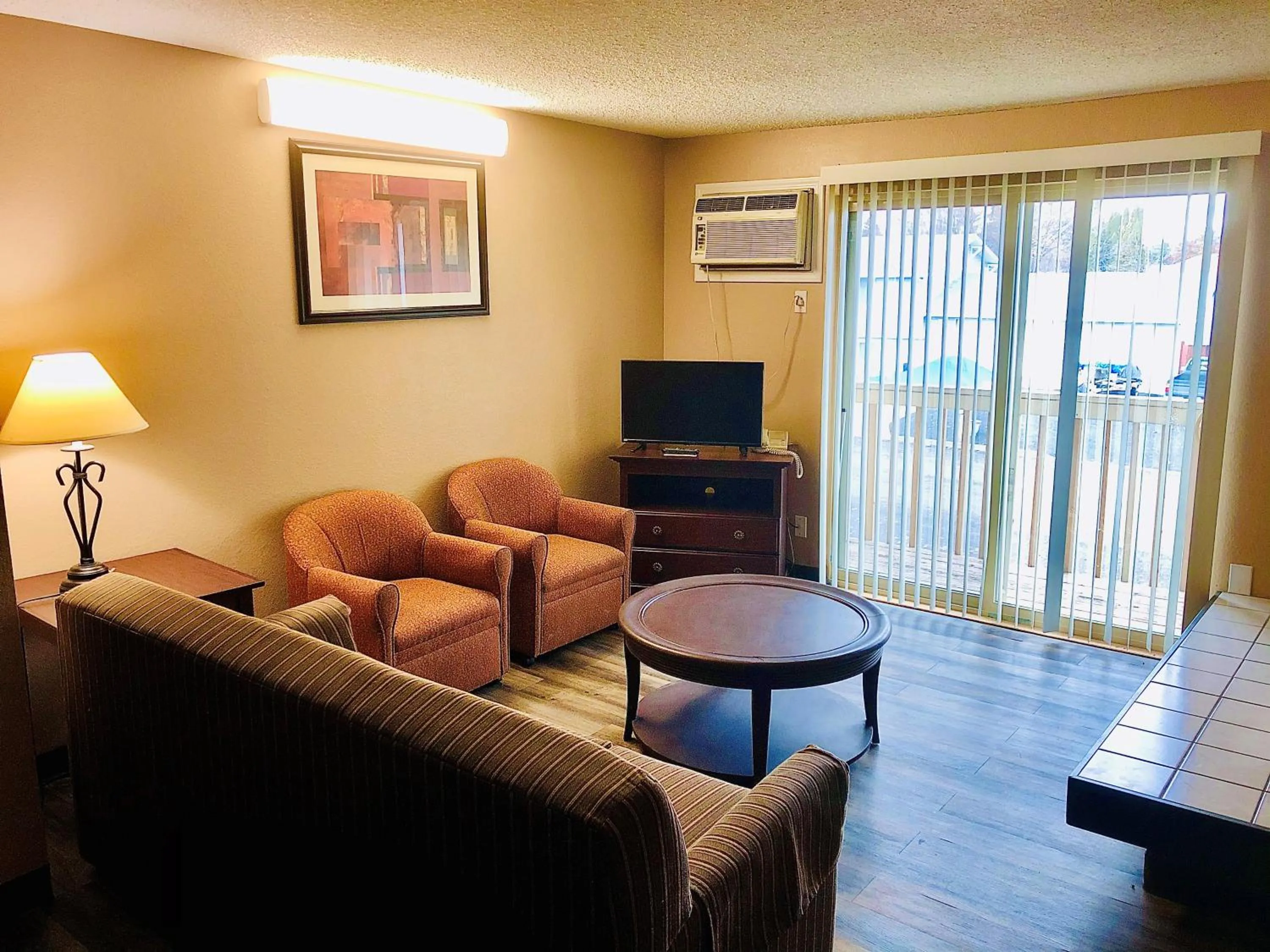Living room in Ramada by Wyndham Spokane Valley