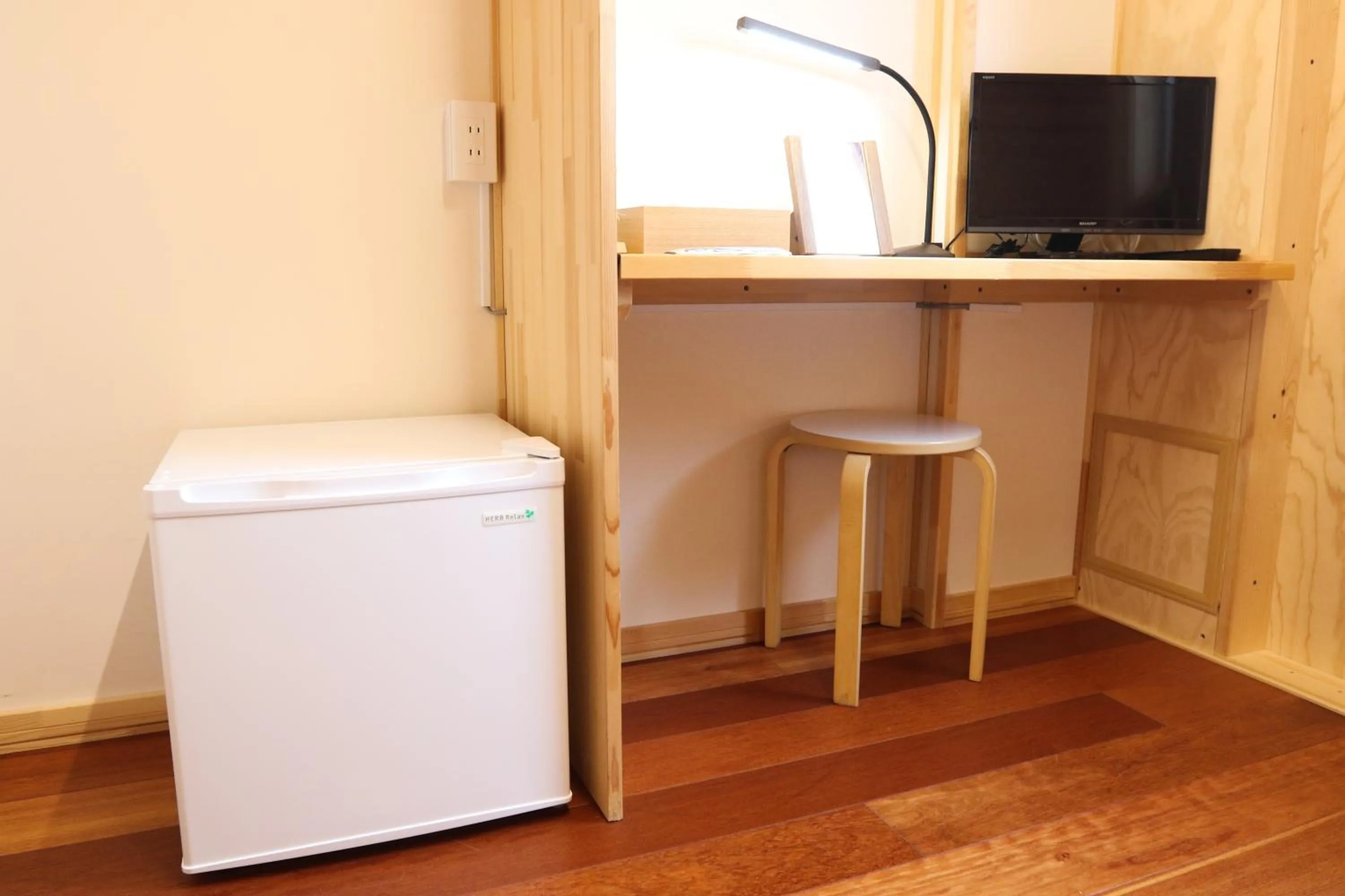 TV and multimedia in Phottage inn Biei