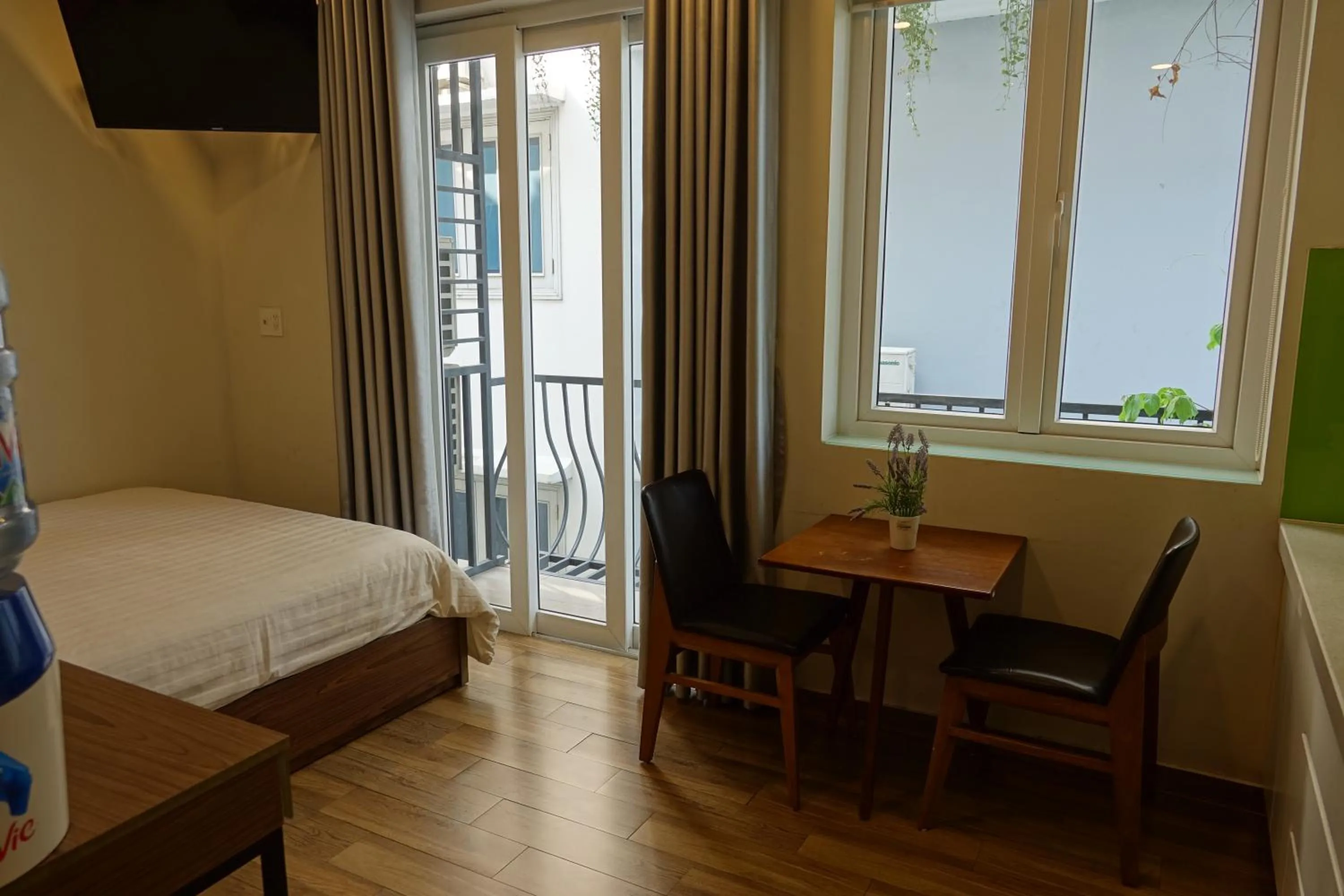 Photo of the whole room, Bed in Spring Light Home