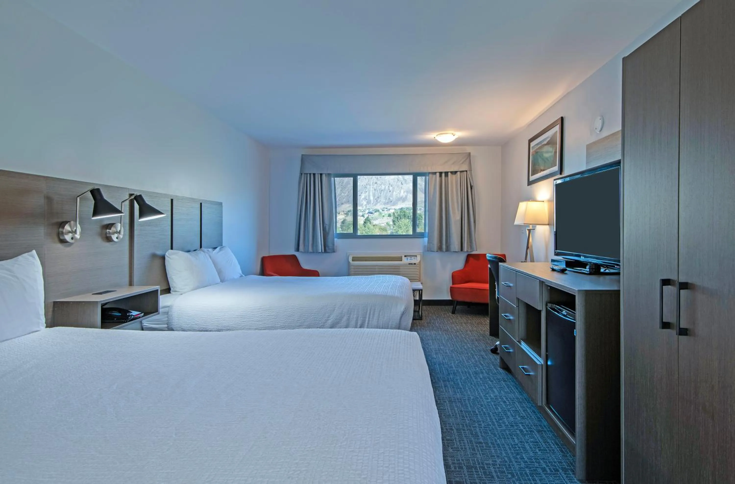 Bedroom, Bed in Riverland Inn & Suites