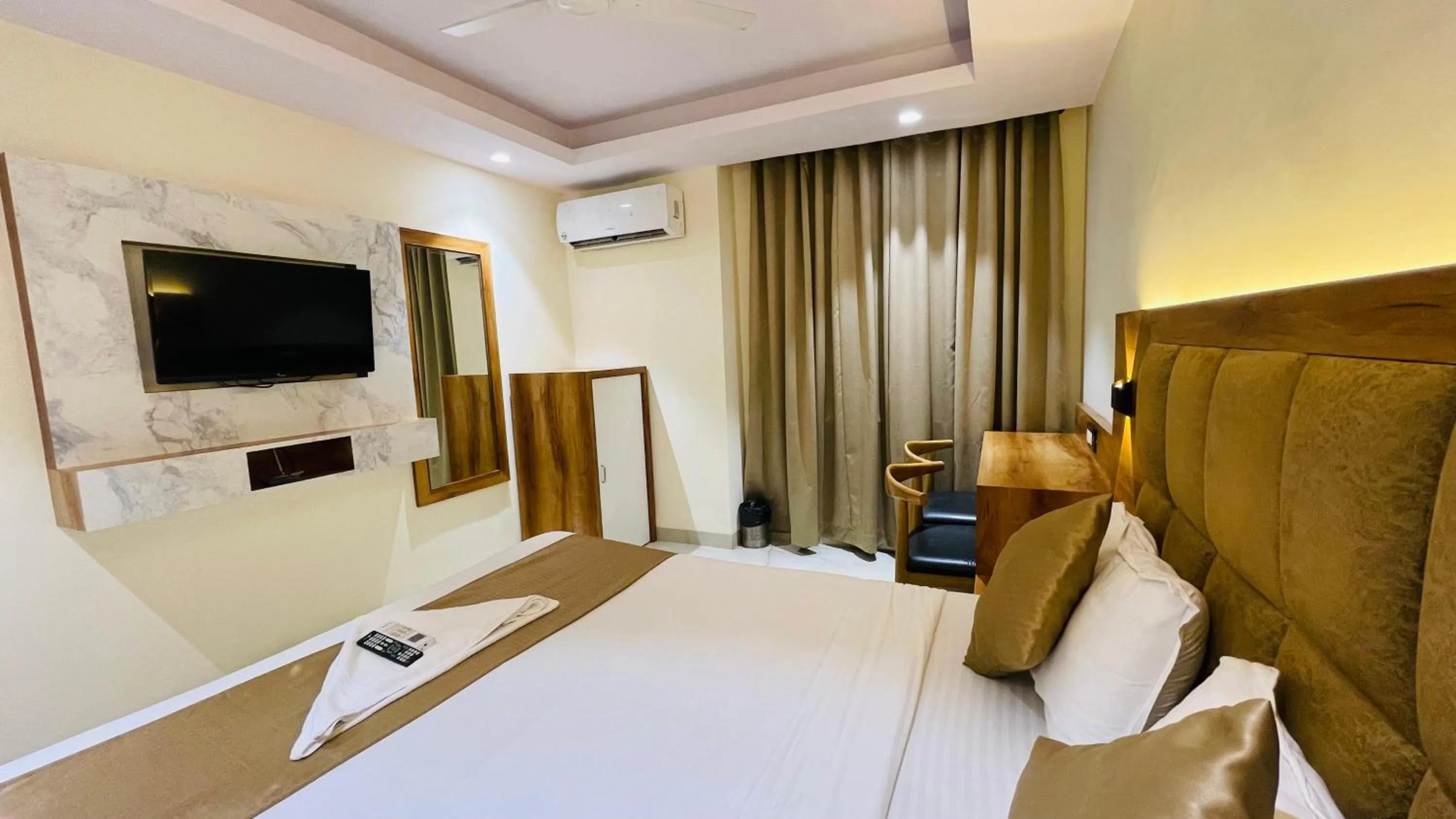 Bed in Hotel Arma Residency