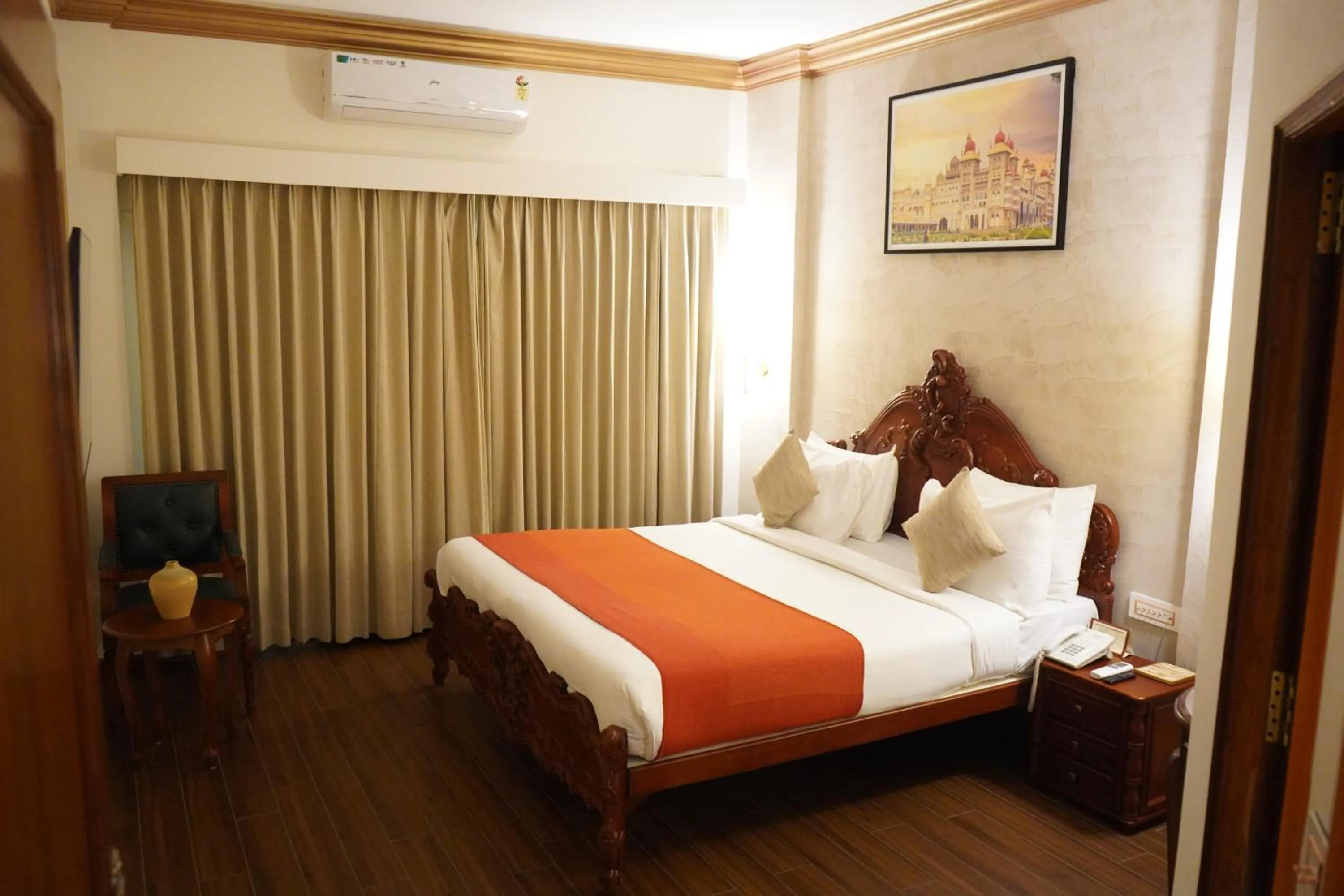 Bed in Nalapad's Hotel Bangalore International