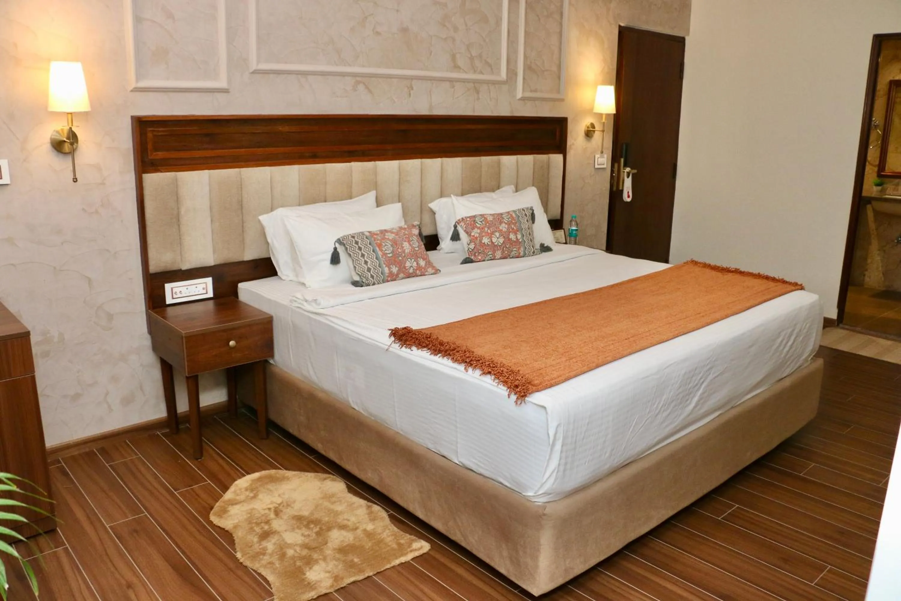 Bed in Nalapad's Hotel Bangalore International