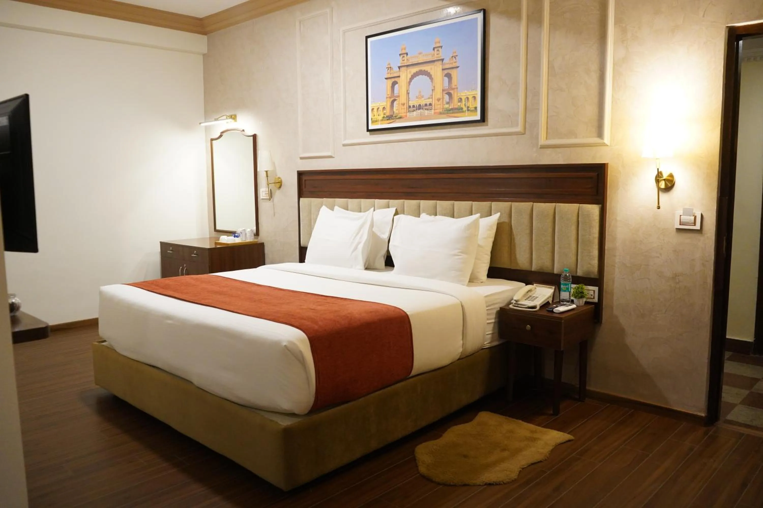 Bed in Nalapad's Hotel Bangalore International