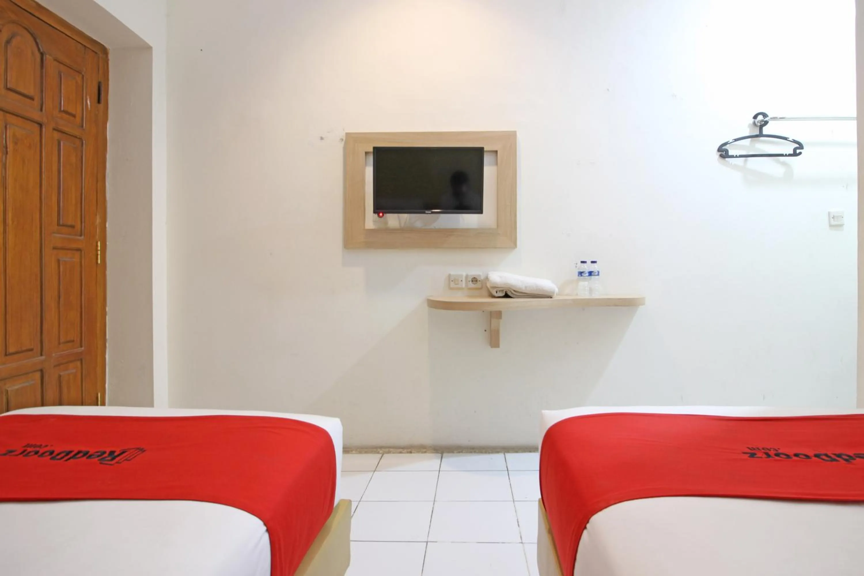 Bedroom in RedDoorz Plus @ Slamet Riyadi