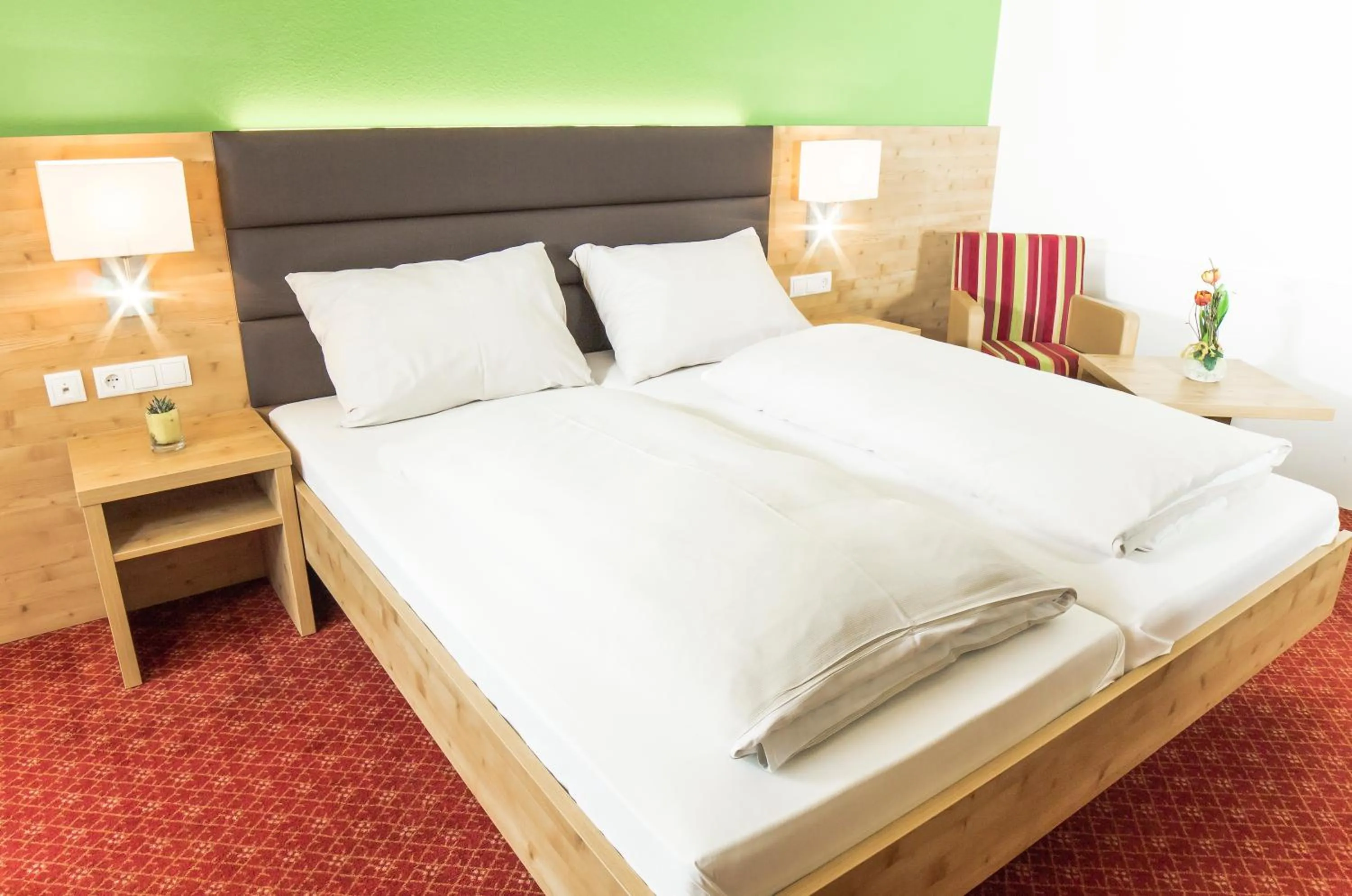 Bed in Hotel Rössl-Dependance Neue Post