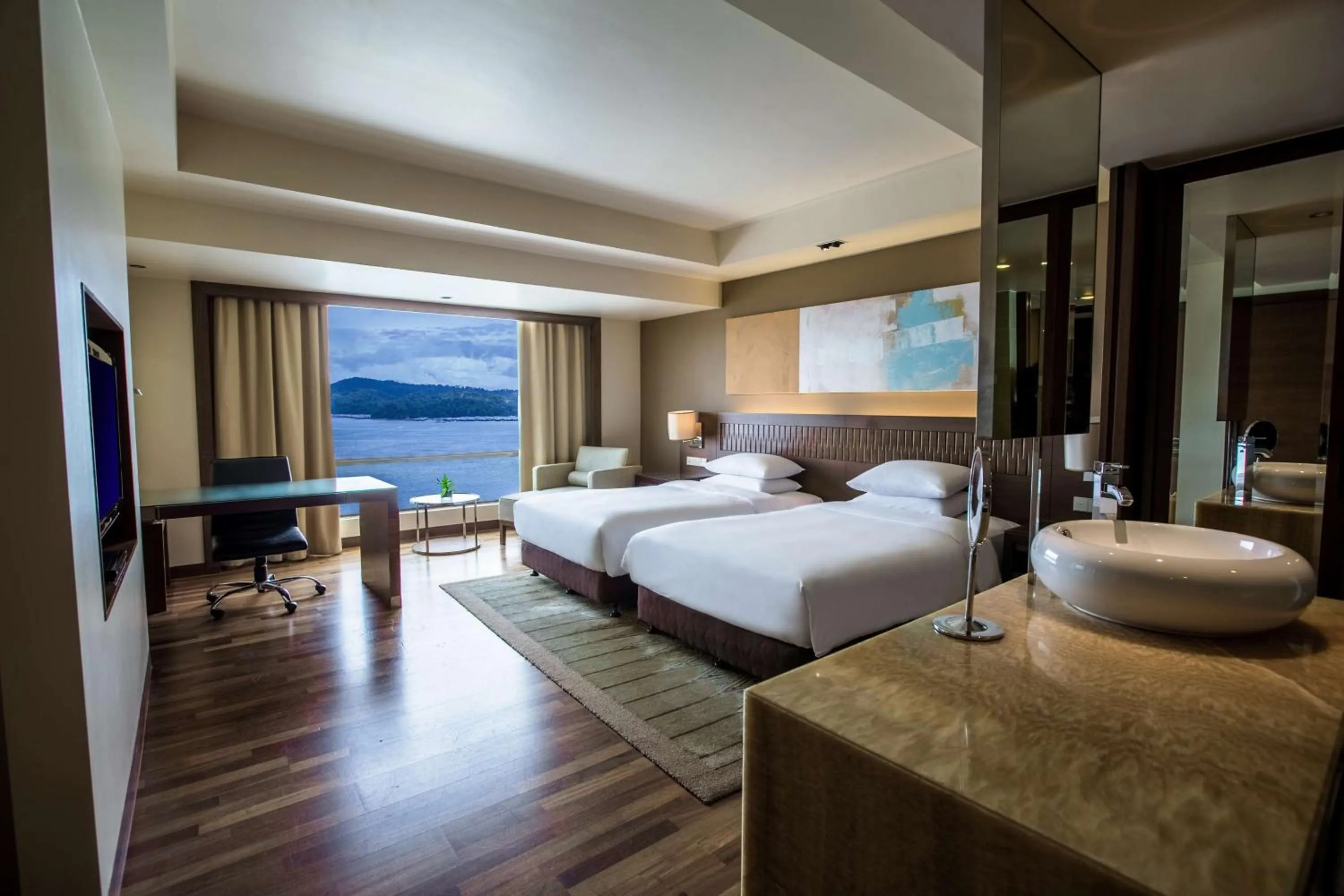 Photo of the whole room, Bed in Hyatt Regency Kinabalu