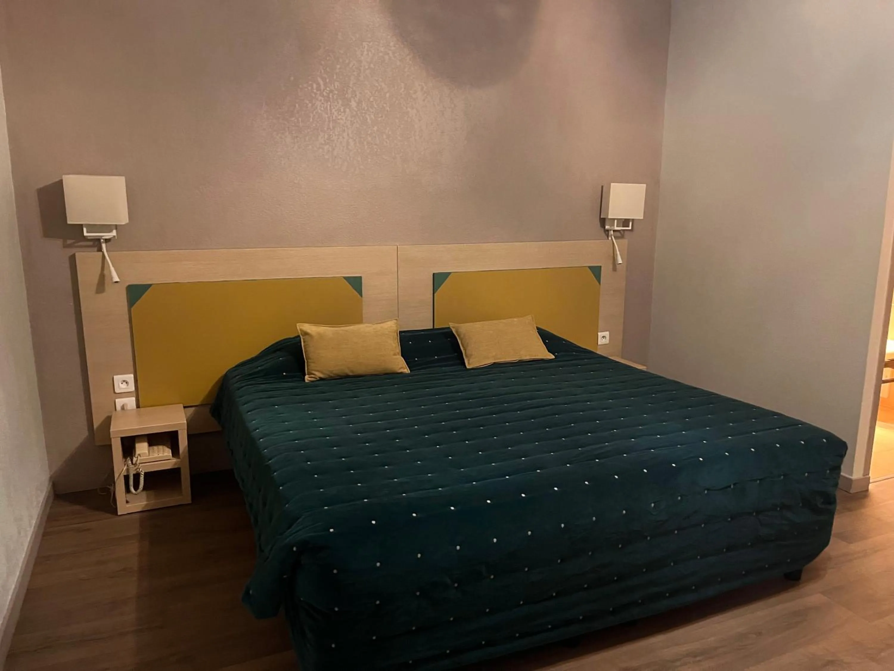 Bed in Hotel Maquis et Mer