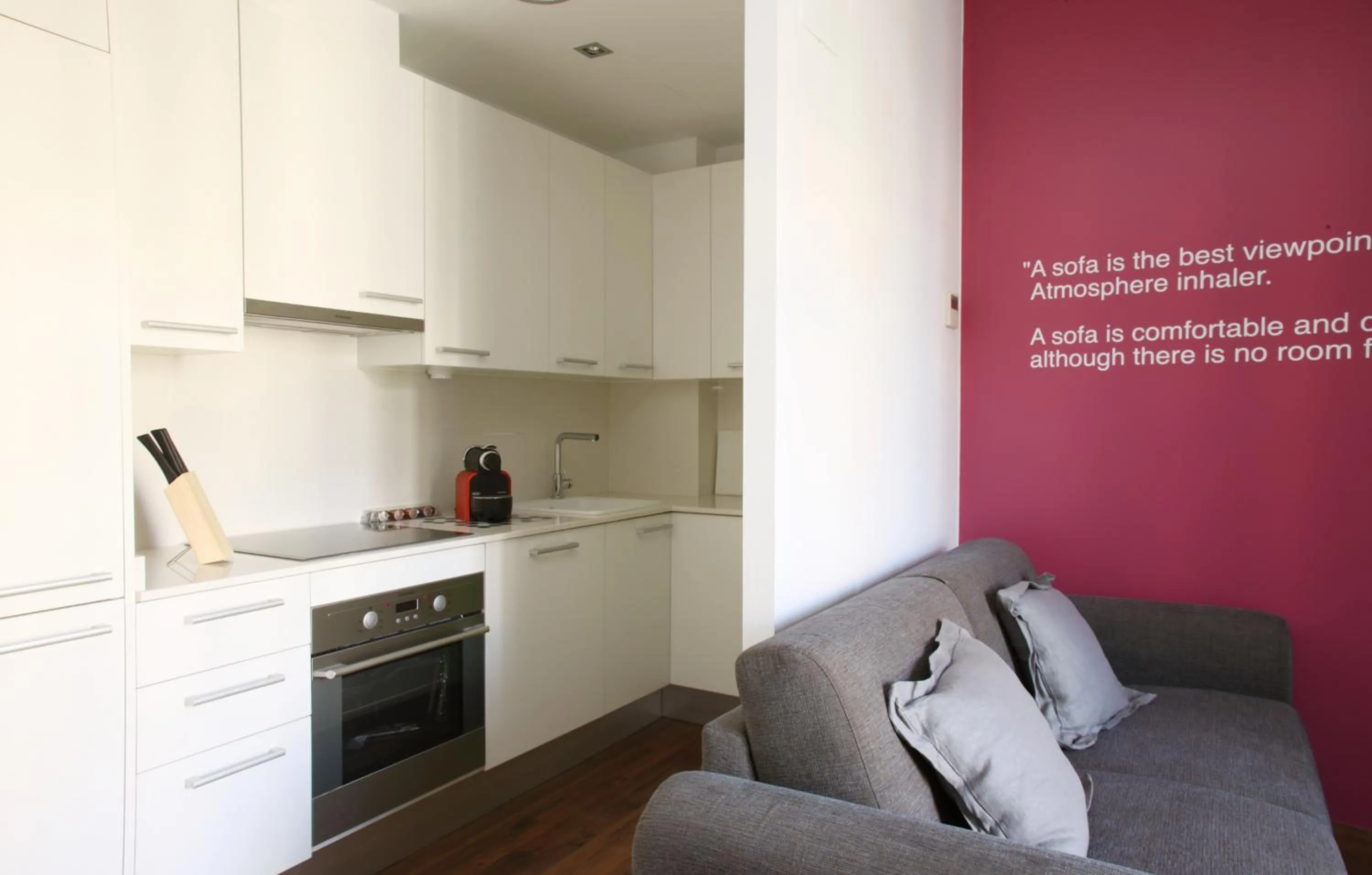 Kitchen or kitchenette in MH Apartments Suites