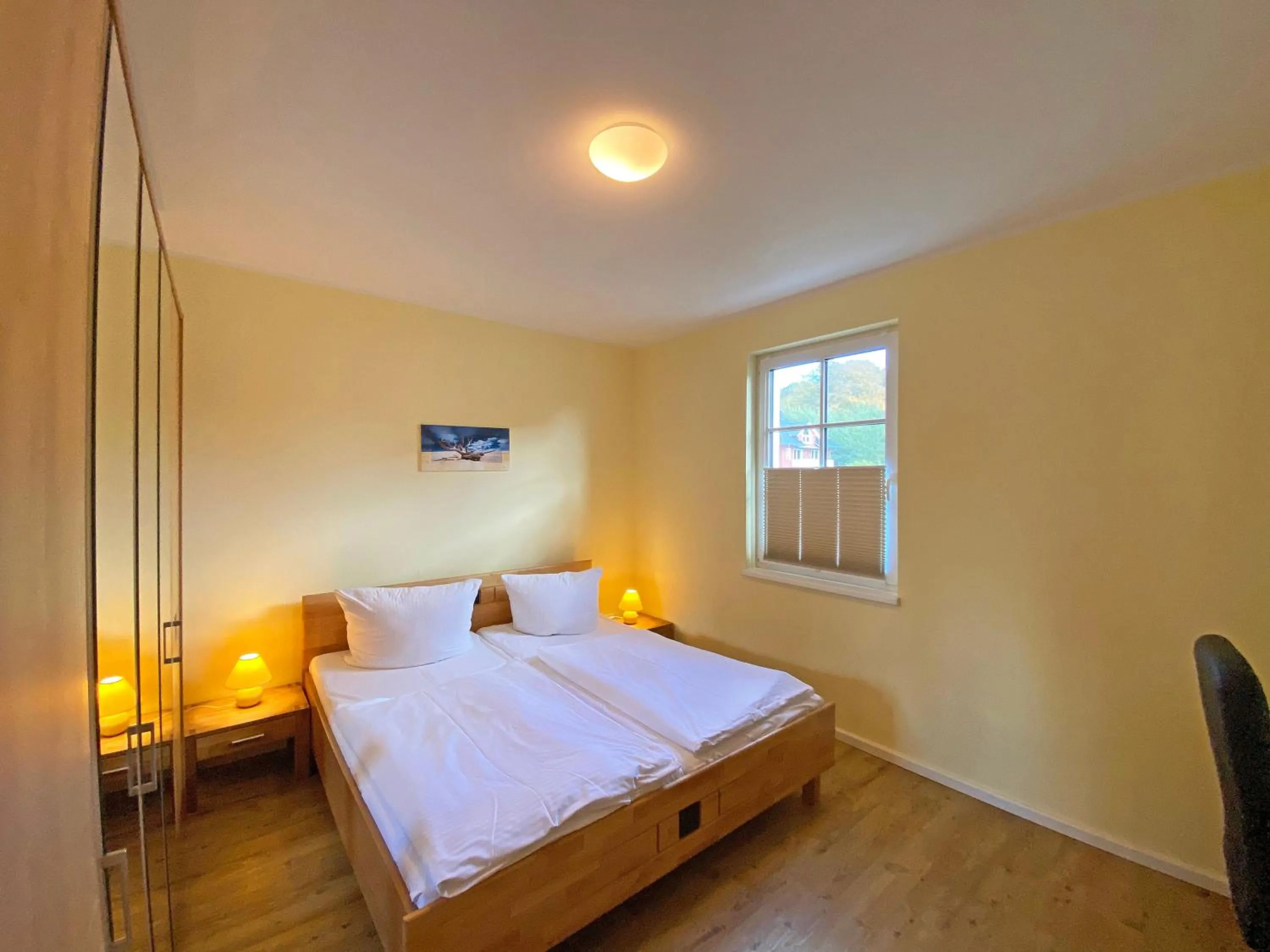 Bed in Villa Annika - Whg 10 mit Westbalkon