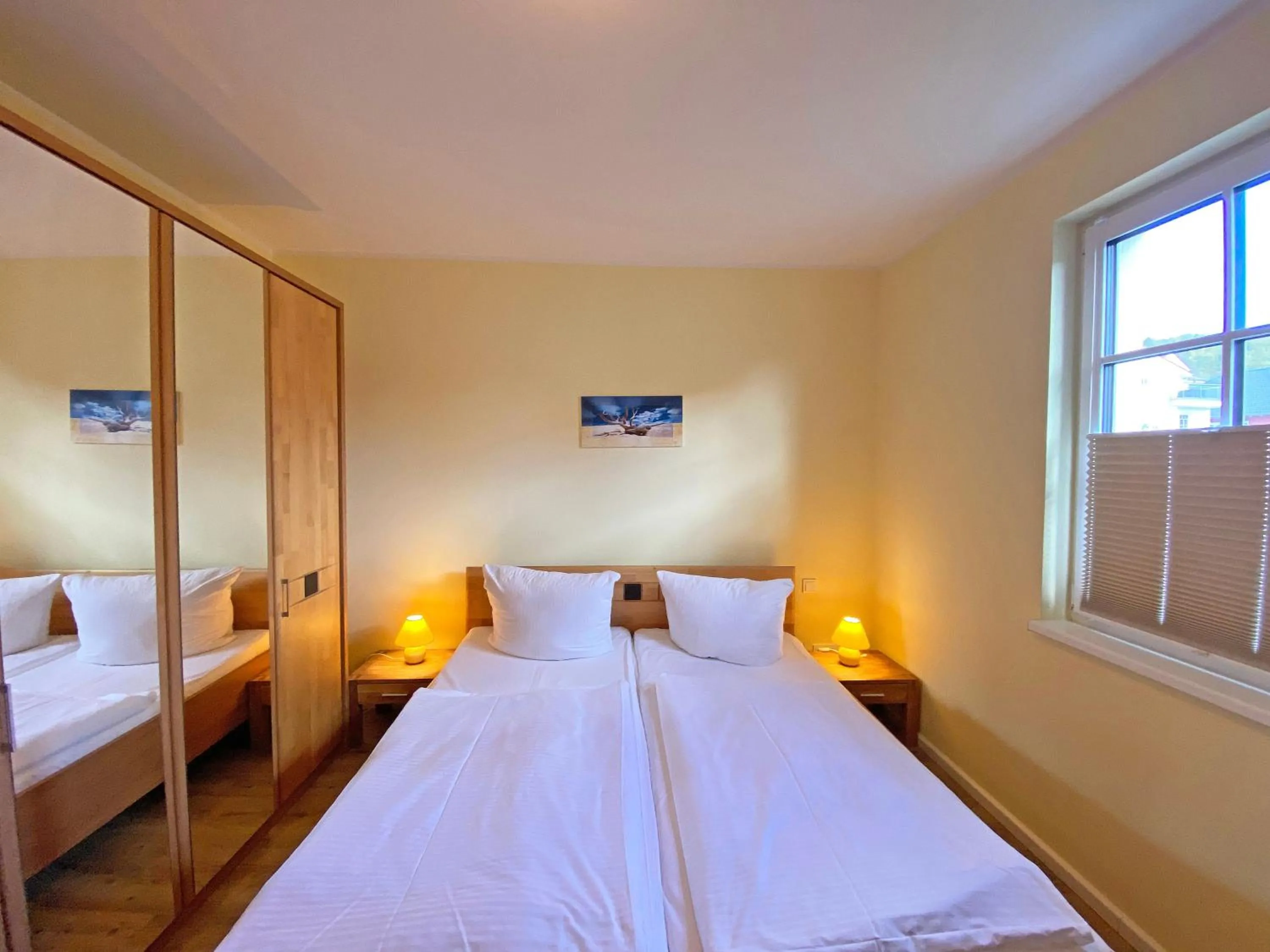 Bed in Villa Annika - Whg 10 mit Westbalkon