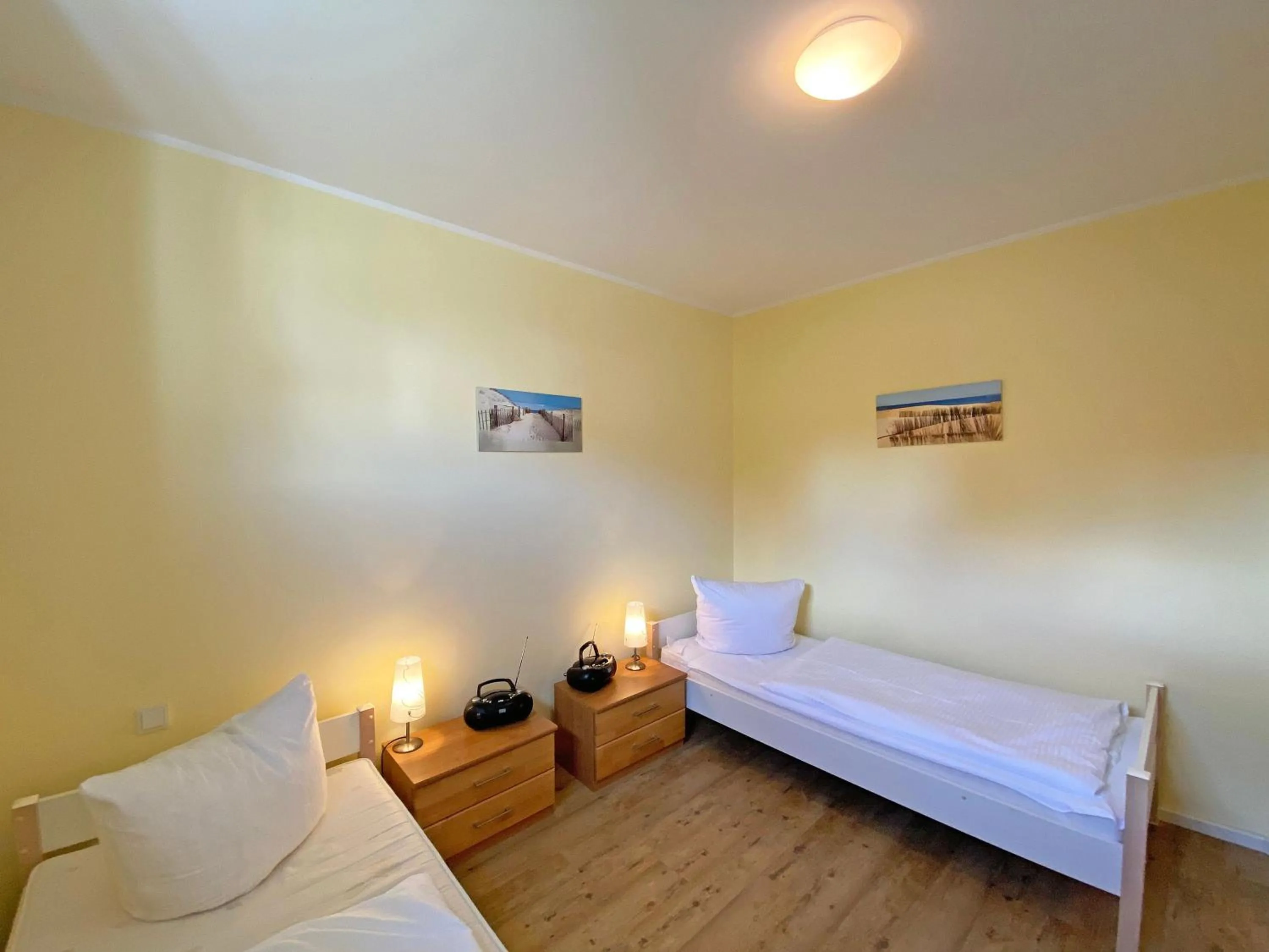 Bed in Villa Annika - Whg 10 mit Westbalkon