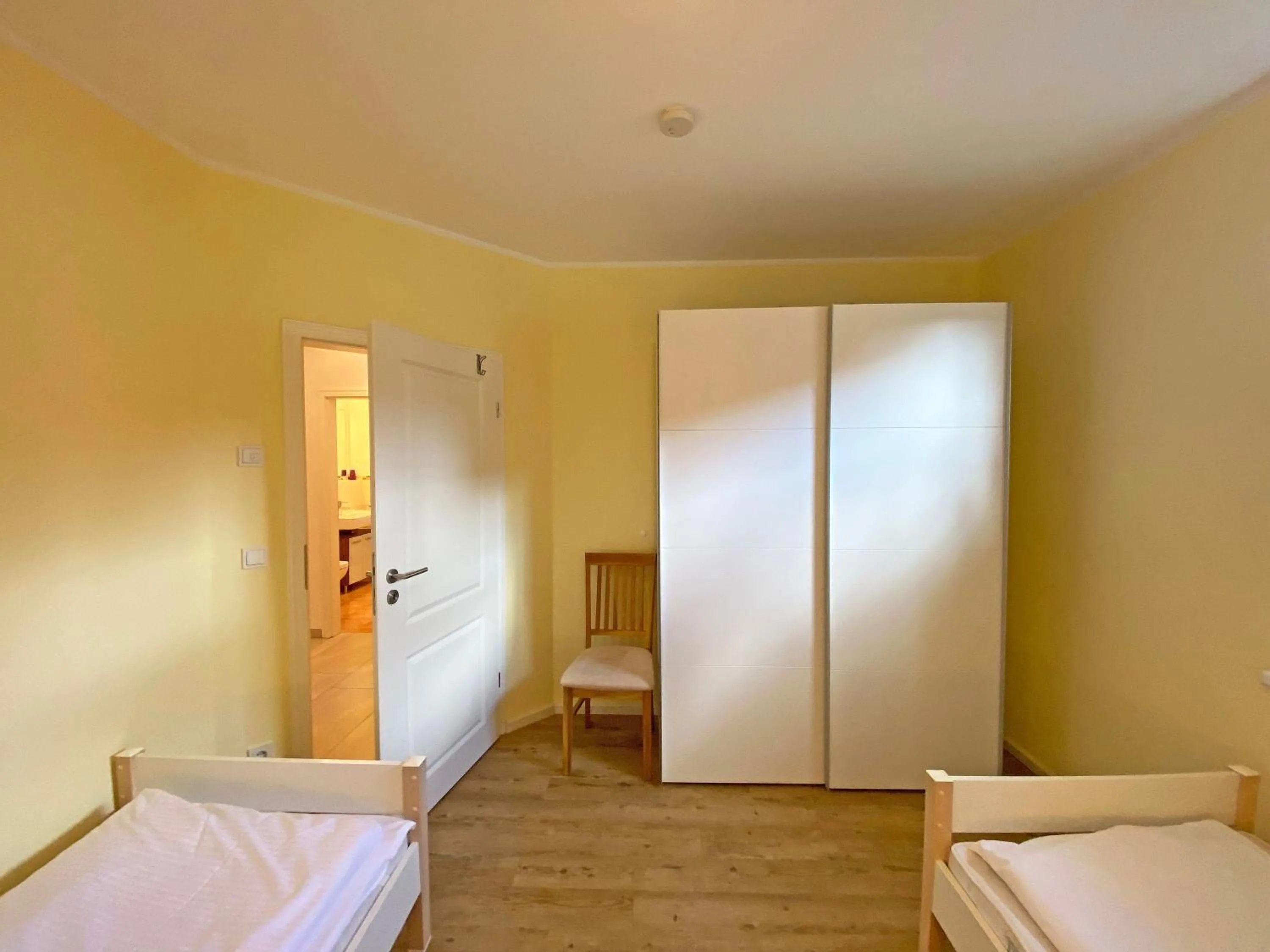 Bed in Villa Annika - Whg 10 mit Westbalkon