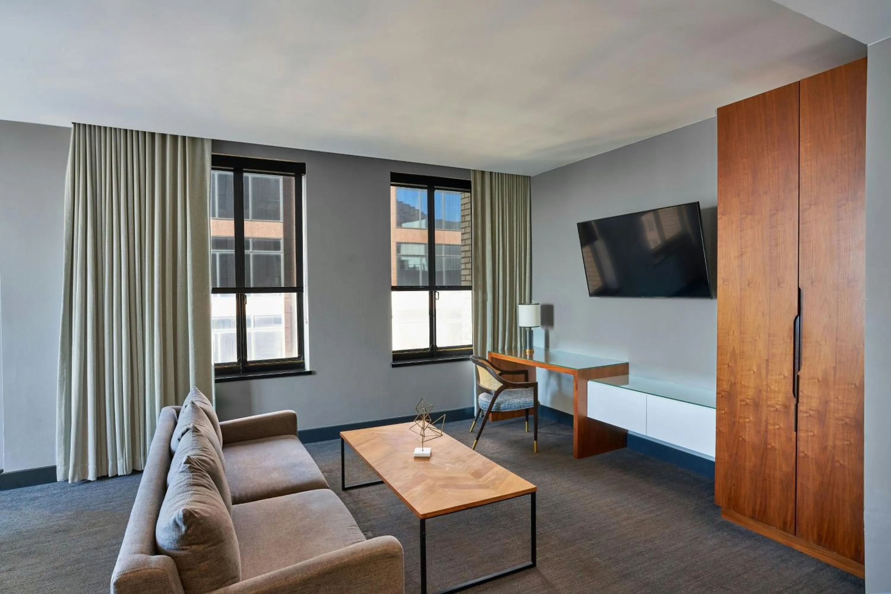 Photo of the whole room, Bed in Renaissance Saint Elm Dallas Downtown Hotel