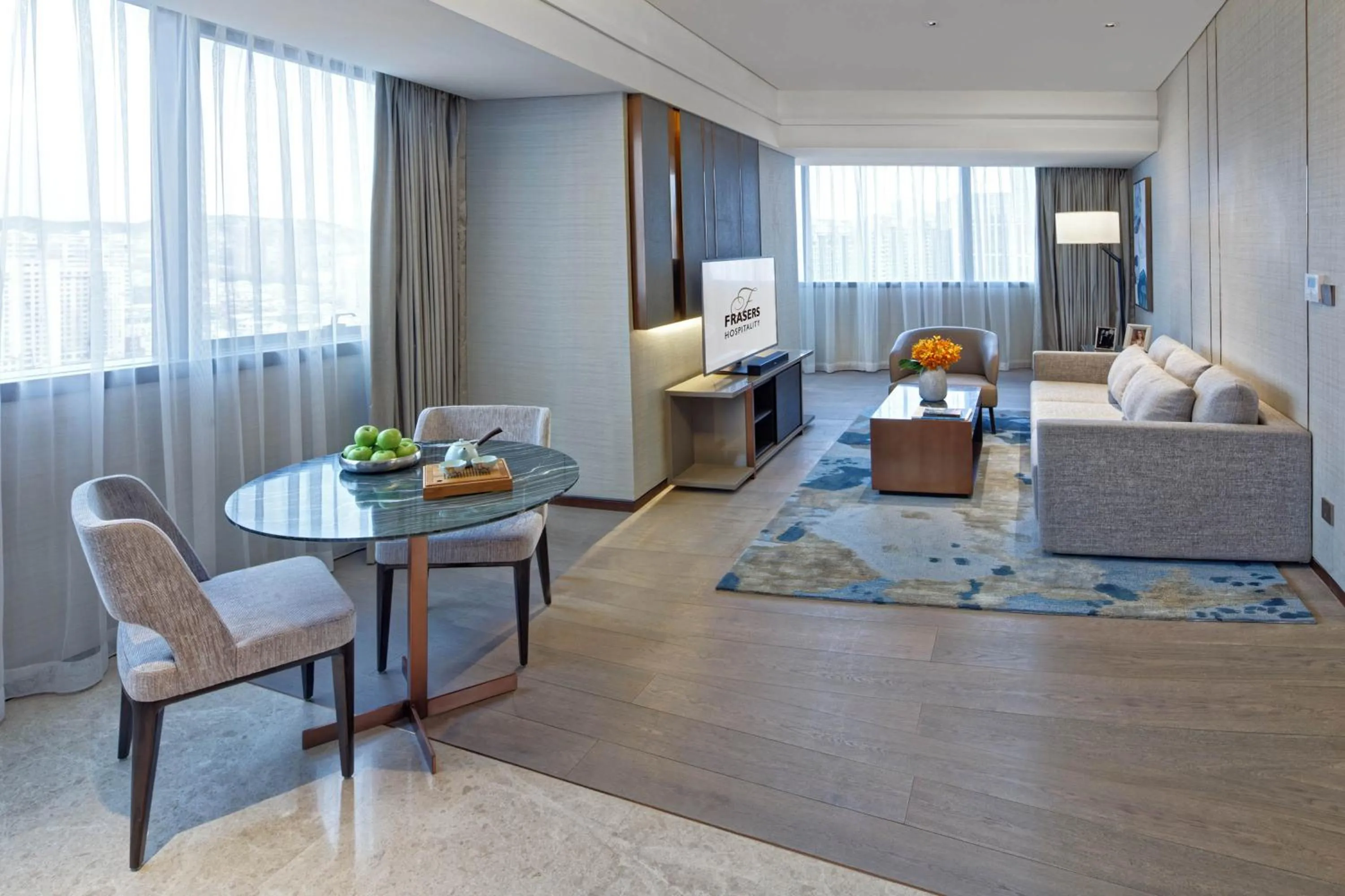 Living room, Bed in Fraser Suites Dalian