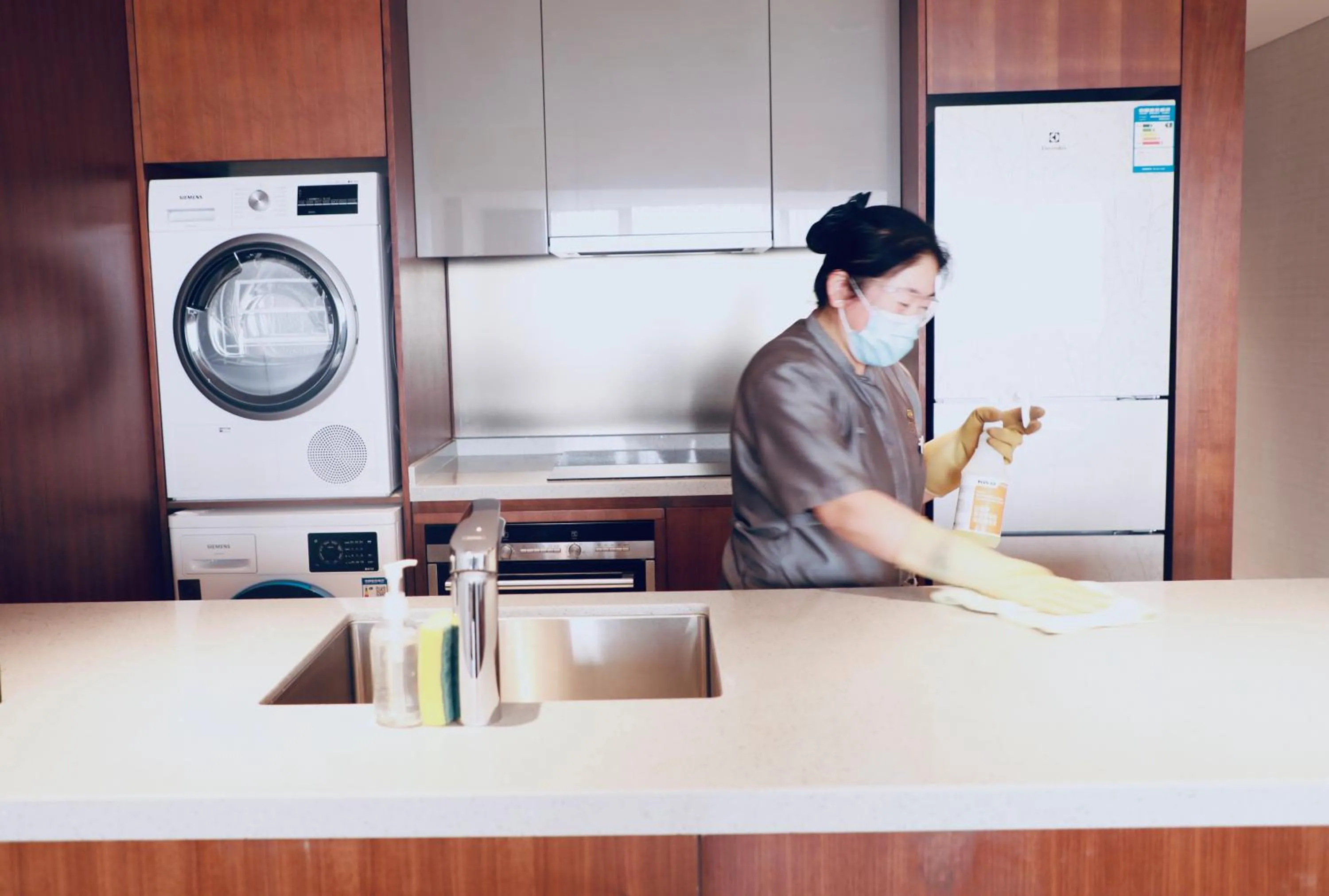 Staff in Fraser Suites Dalian