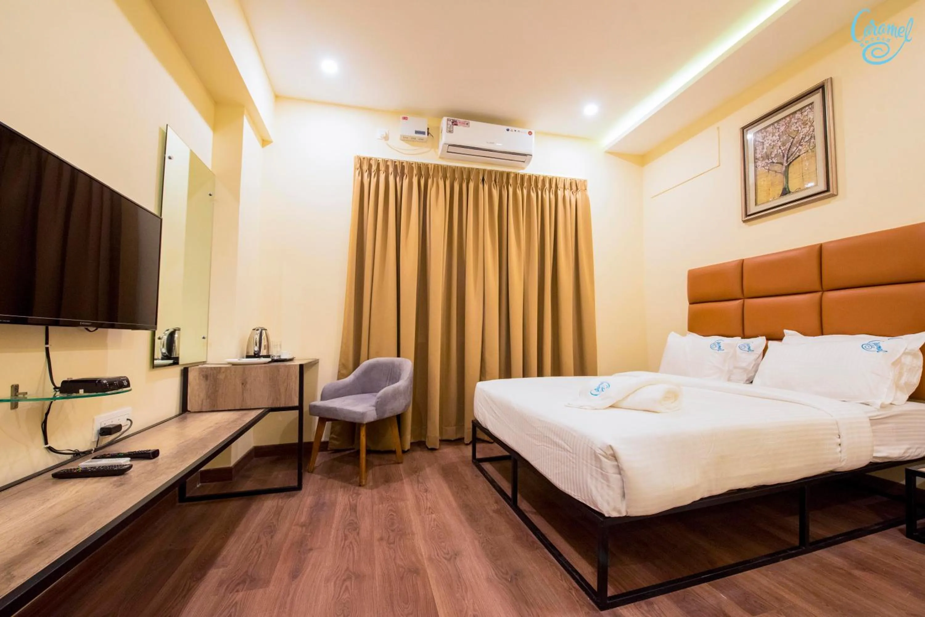 Bedroom, Bed in Caramel Hotels