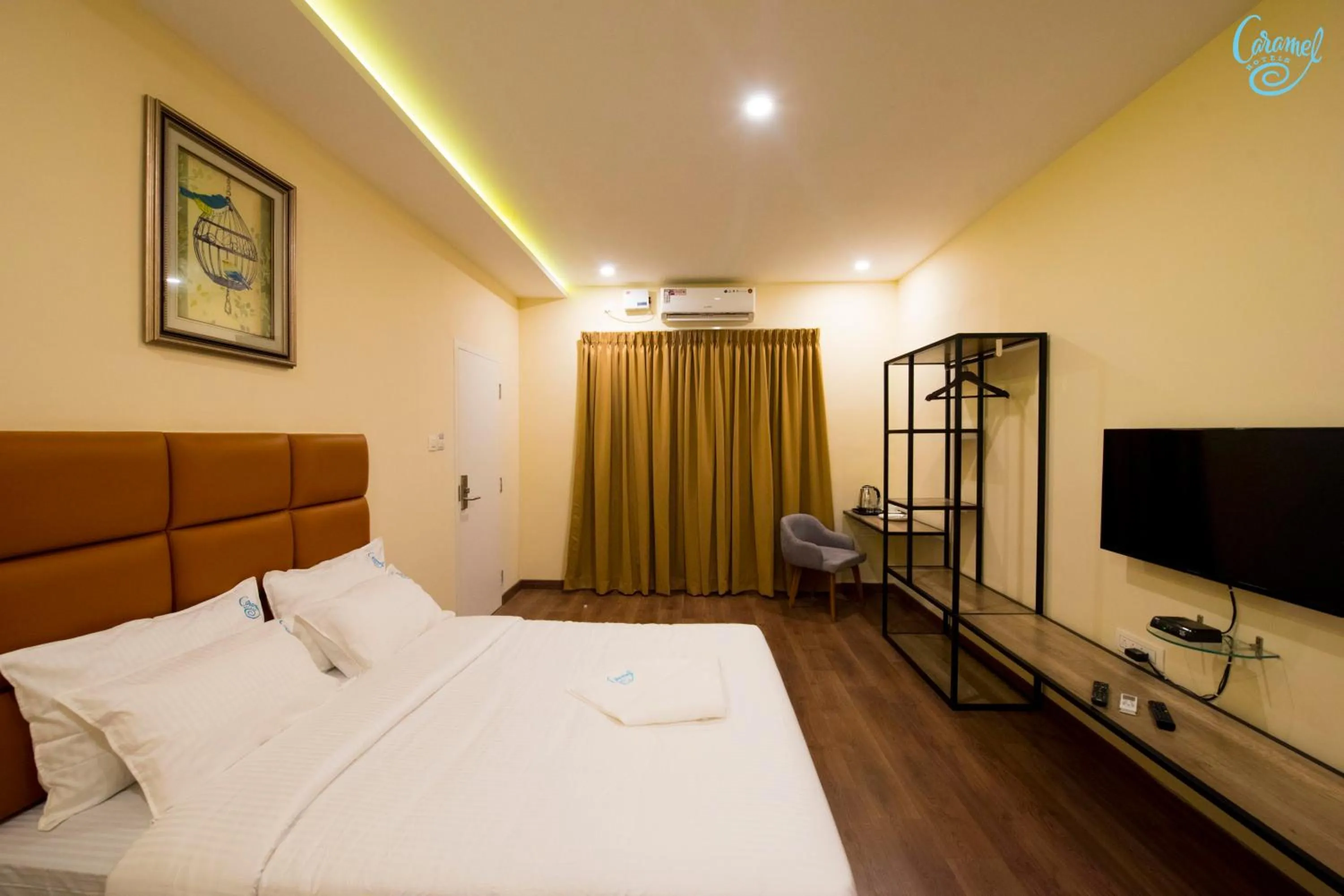 Bedroom, Bed in Caramel Hotels