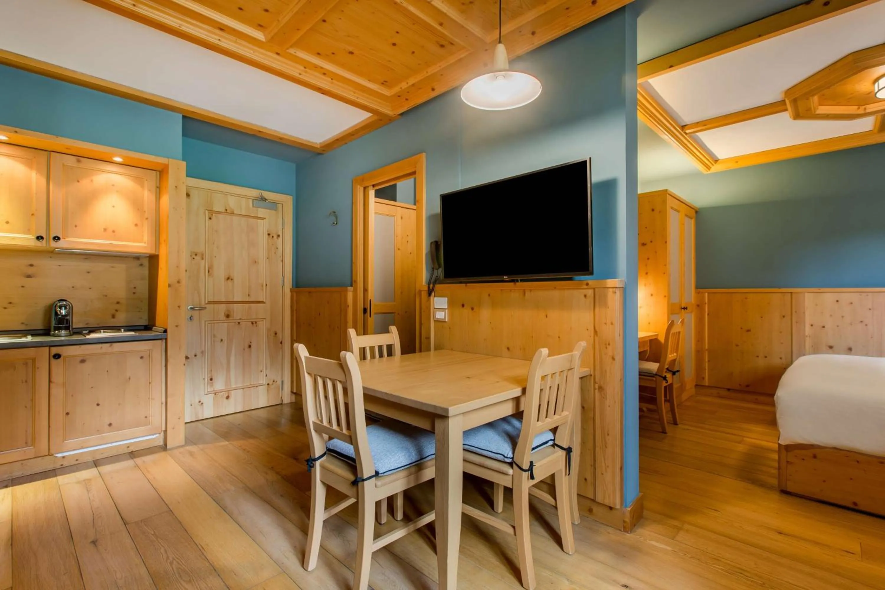 Photo of the whole room in Radisson Residences Savoia Palace Cortina d’Ampezzo