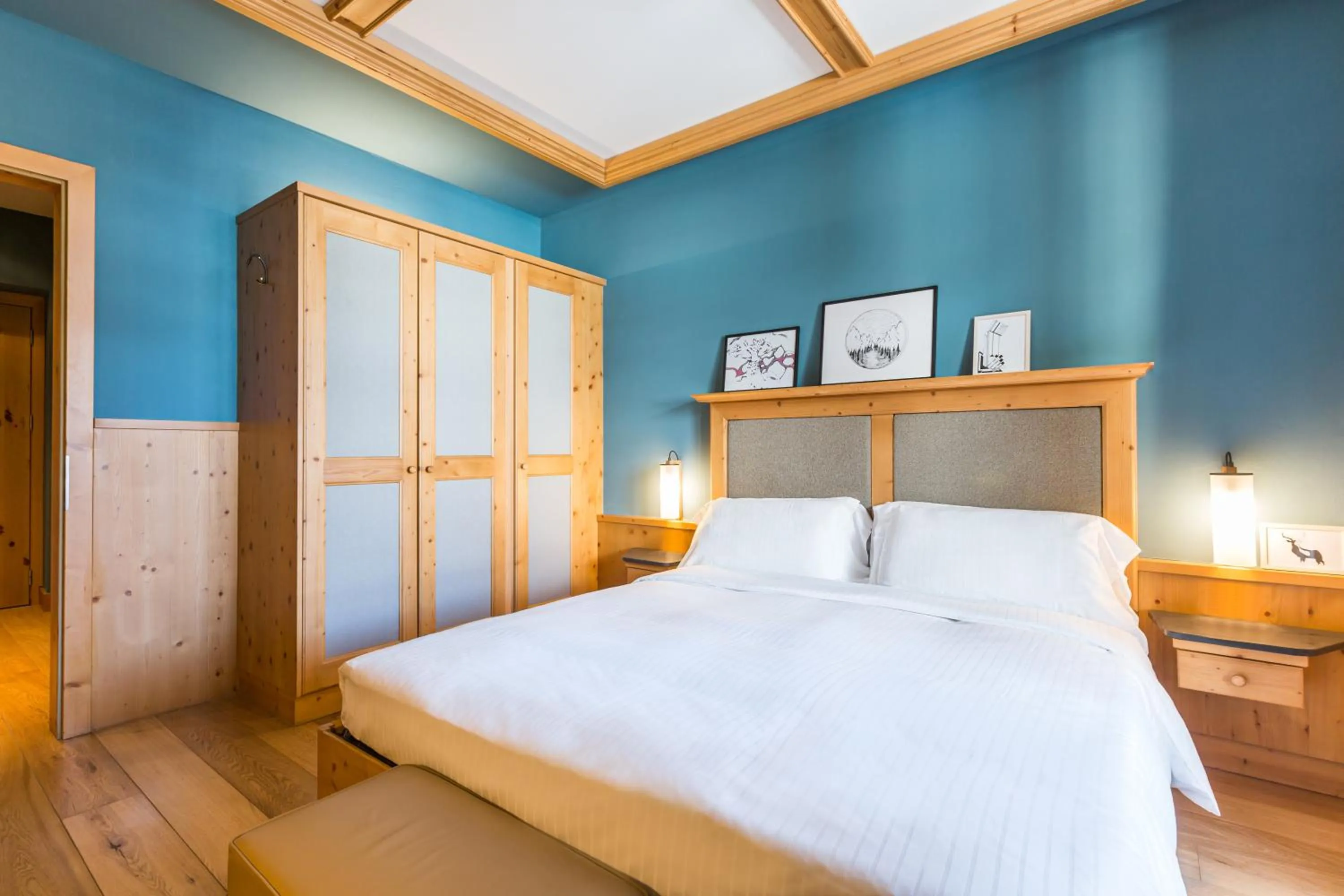 Bedroom, Bed in Radisson Residences Savoia Palace Cortina d’Ampezzo