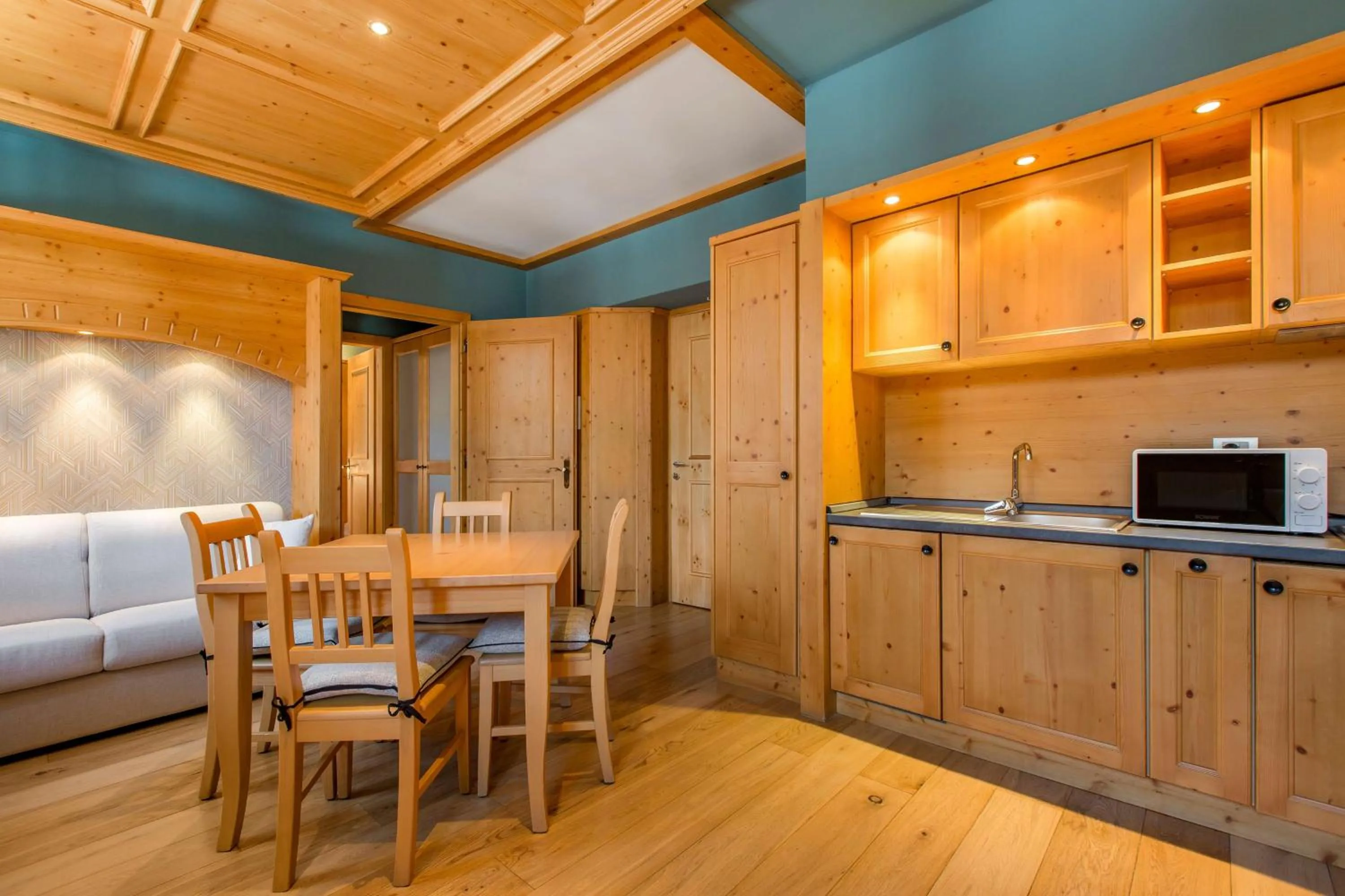 Photo of the whole room in Radisson Residences Savoia Palace Cortina d’Ampezzo