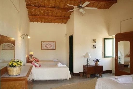 Photo of the whole room, Bed in Masseria Cianciò