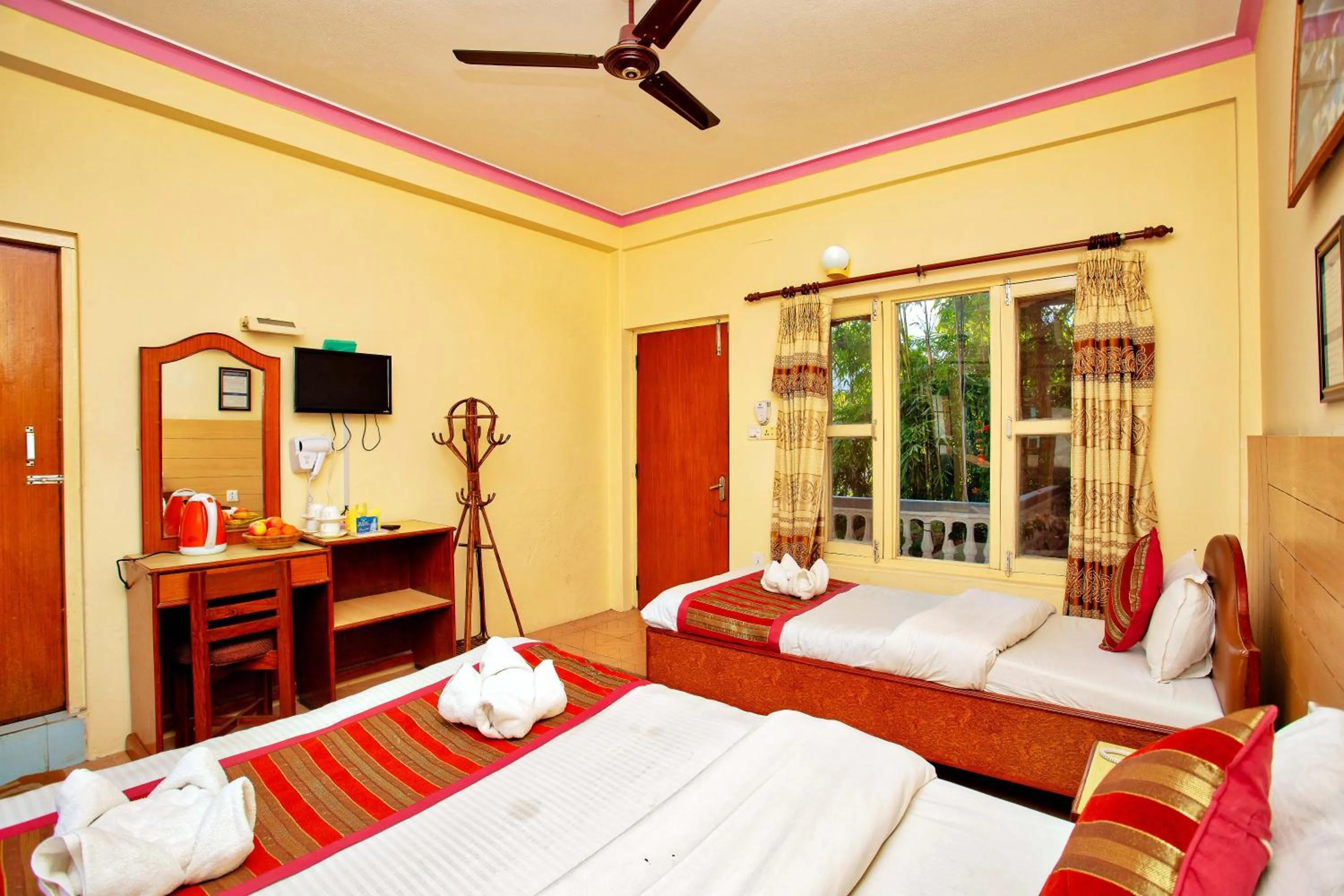 Bed in Hotel Grand Holiday