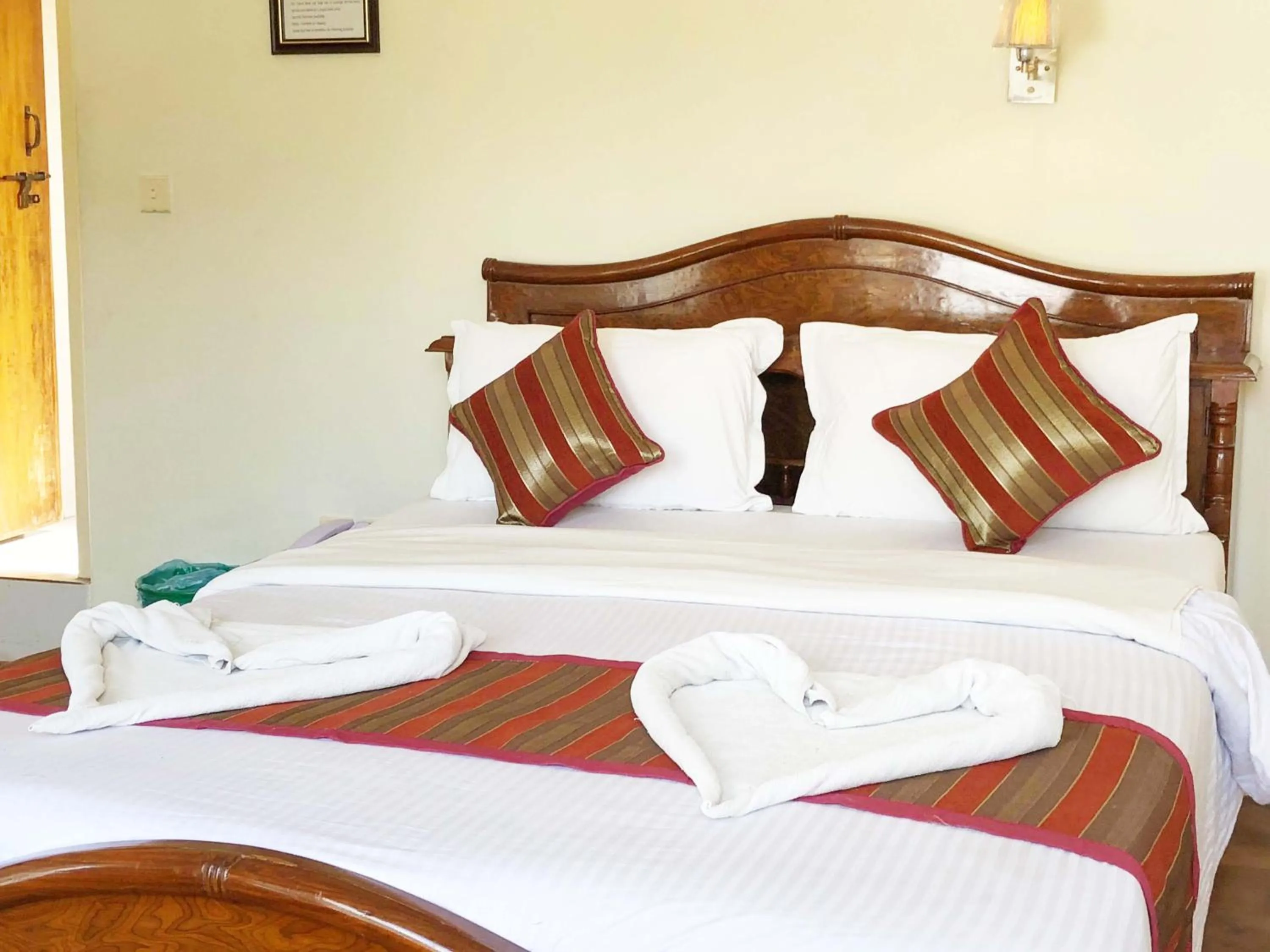 Bed in Hotel Grand Holiday