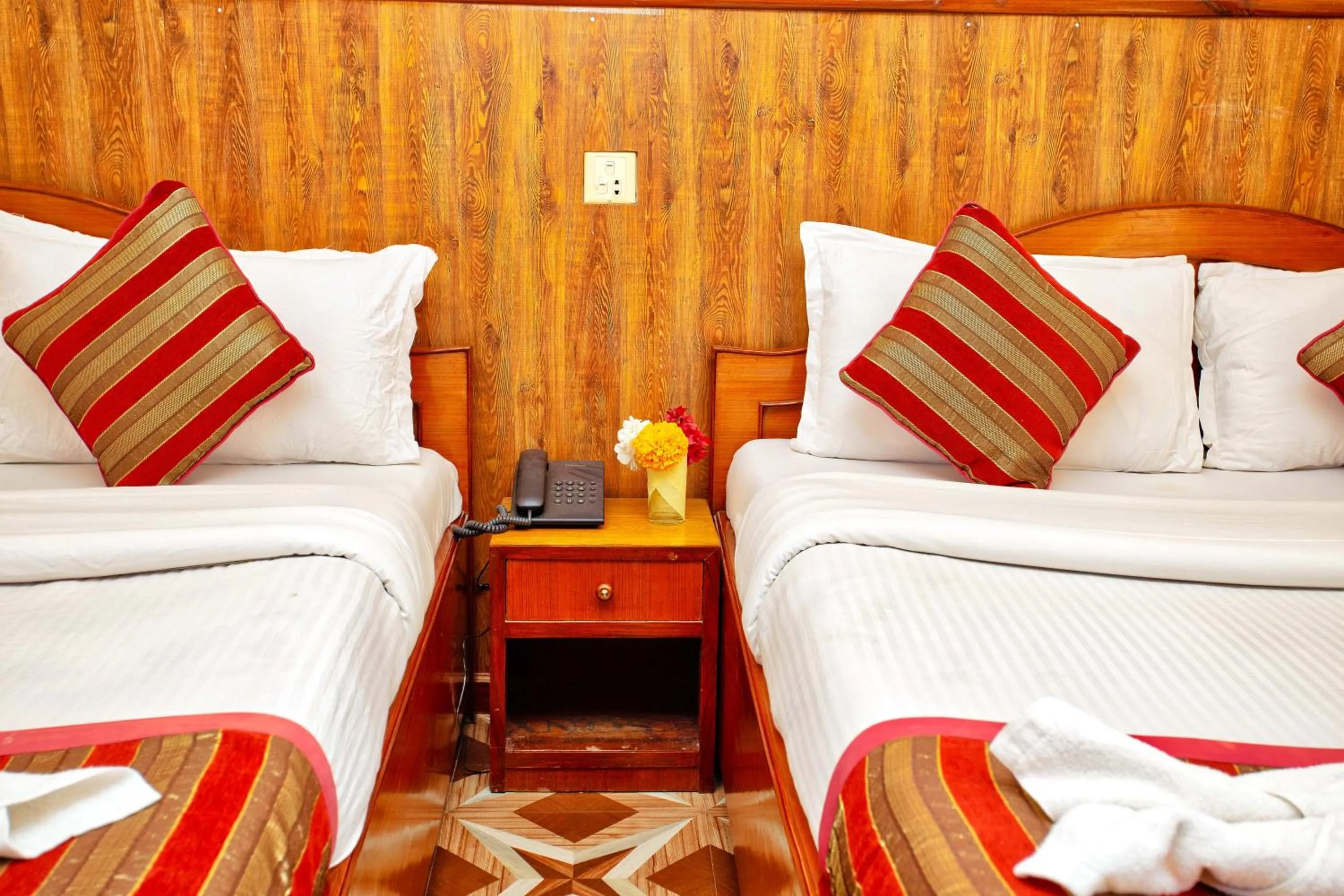 Bed in Hotel Grand Holiday