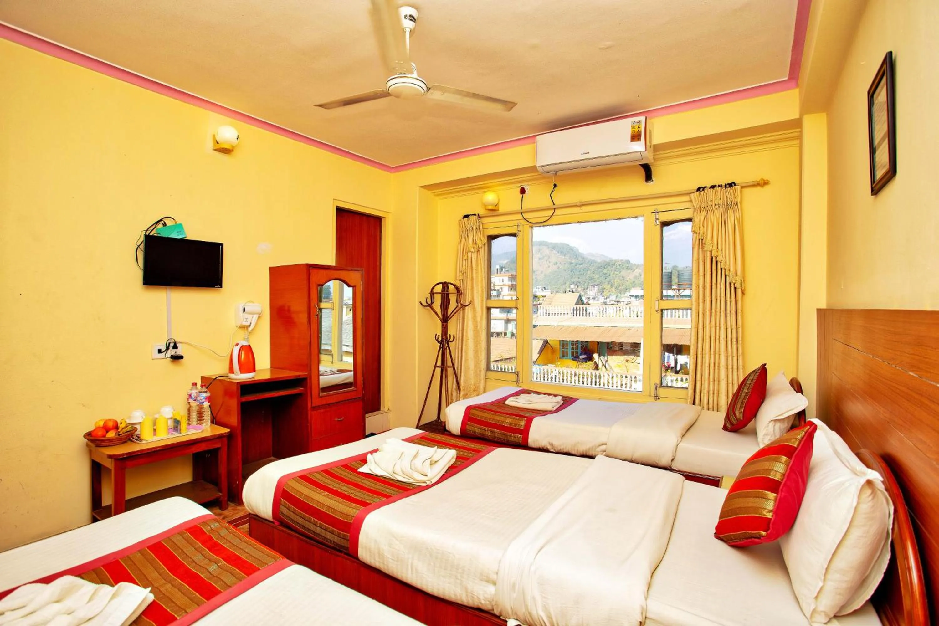 Bed in Hotel Grand Holiday