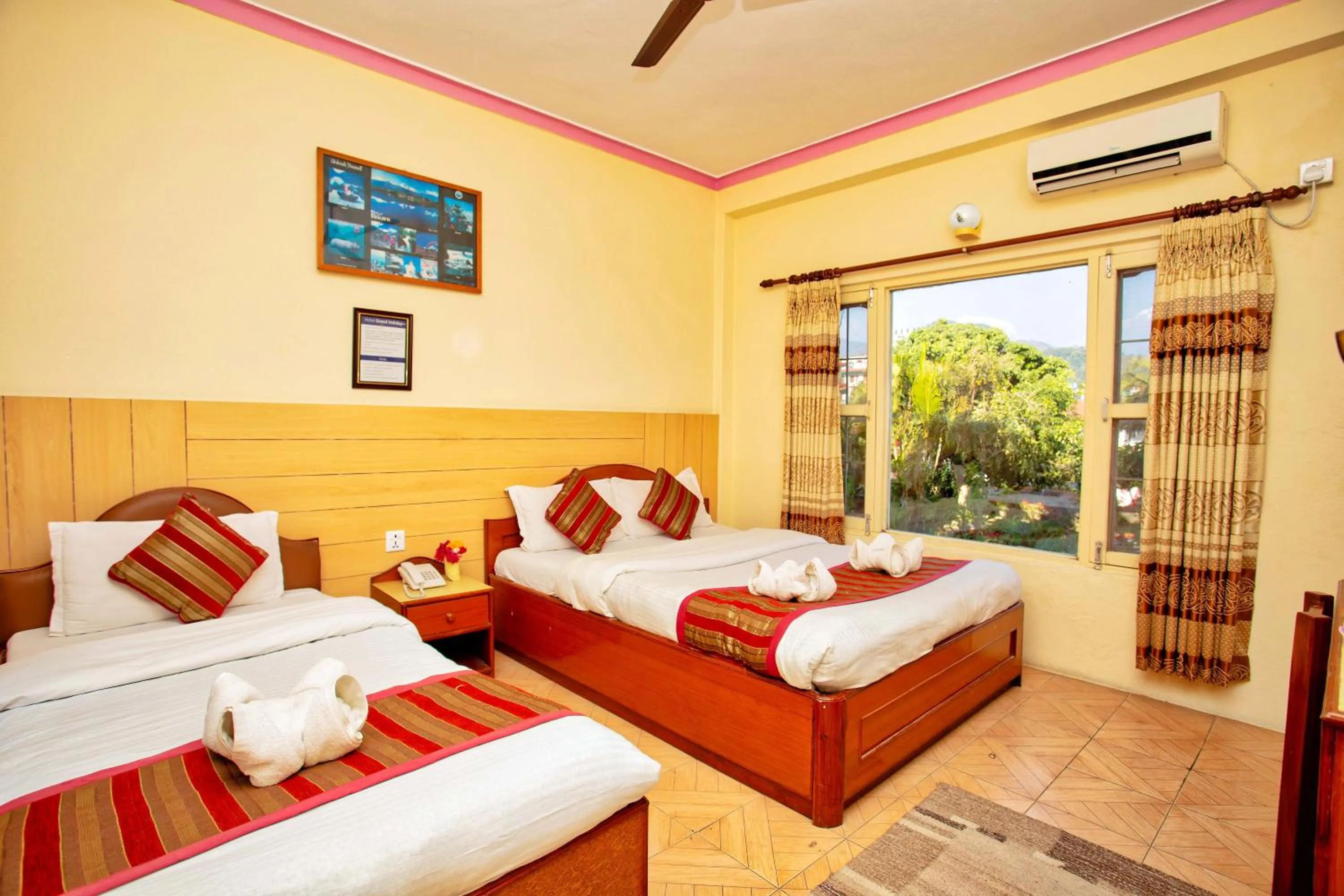 Bed in Hotel Grand Holiday